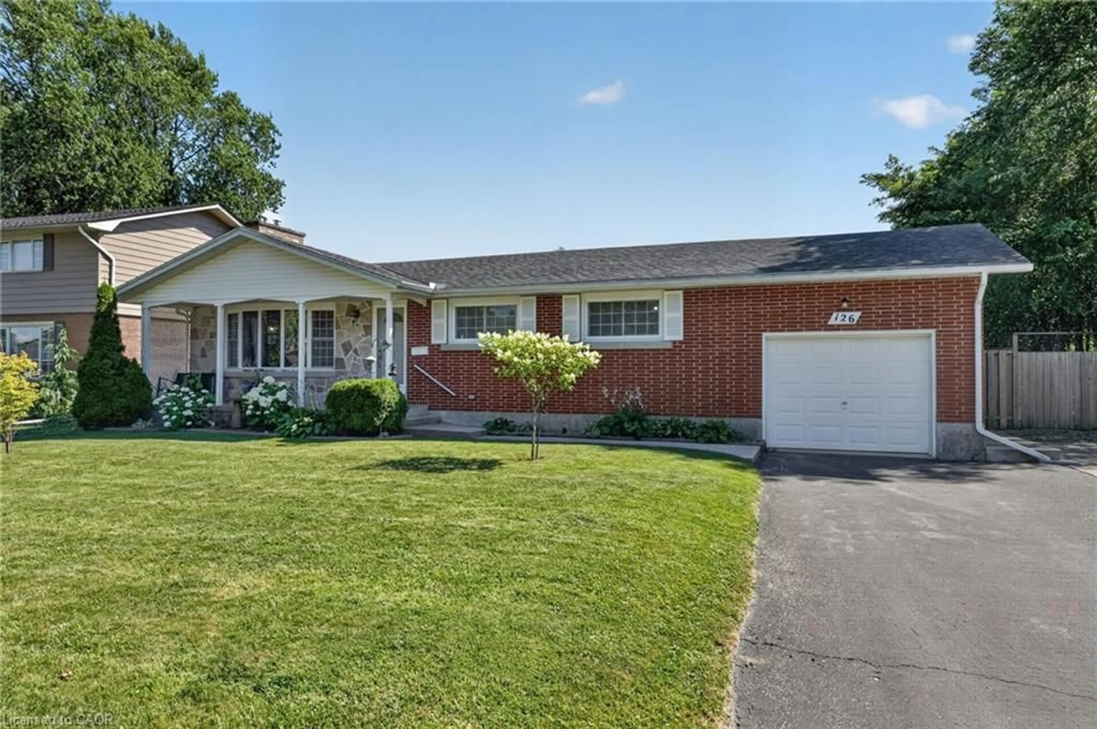 Home with vinyl exterior material, street for 126 Victoria Ave, Dunnville Ontario N1A 1A5