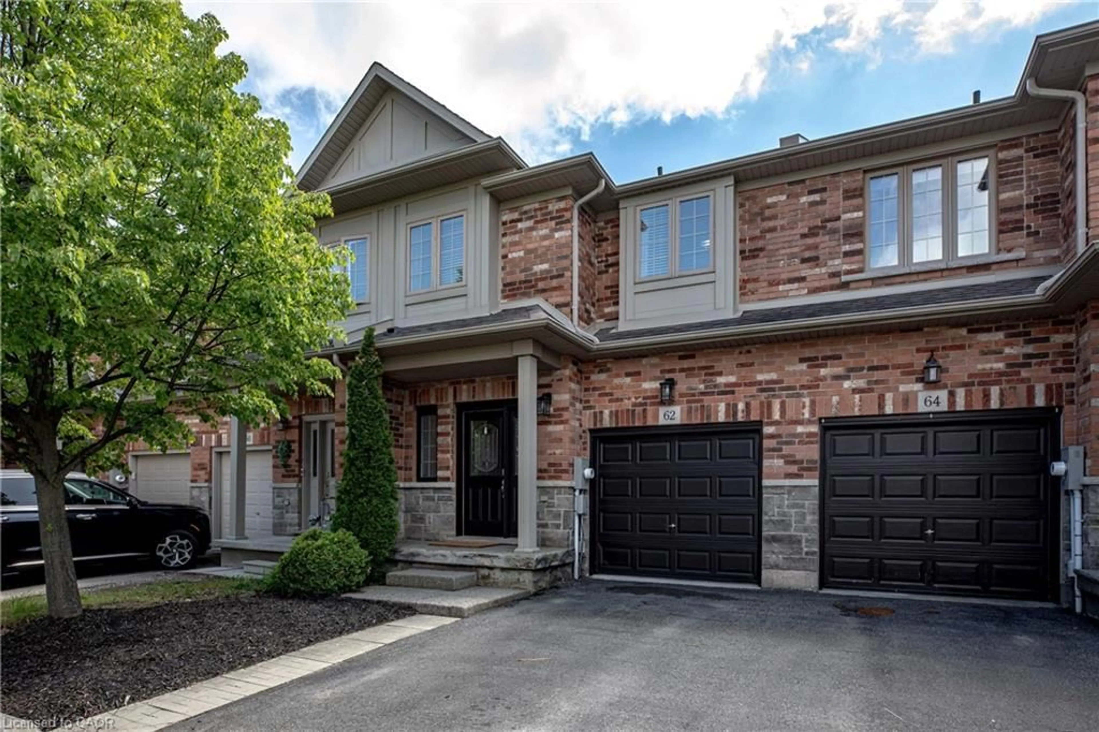 Home with brick exterior material, street for 62 Fall Fair Way, Binbrook Ontario L0R 1C0