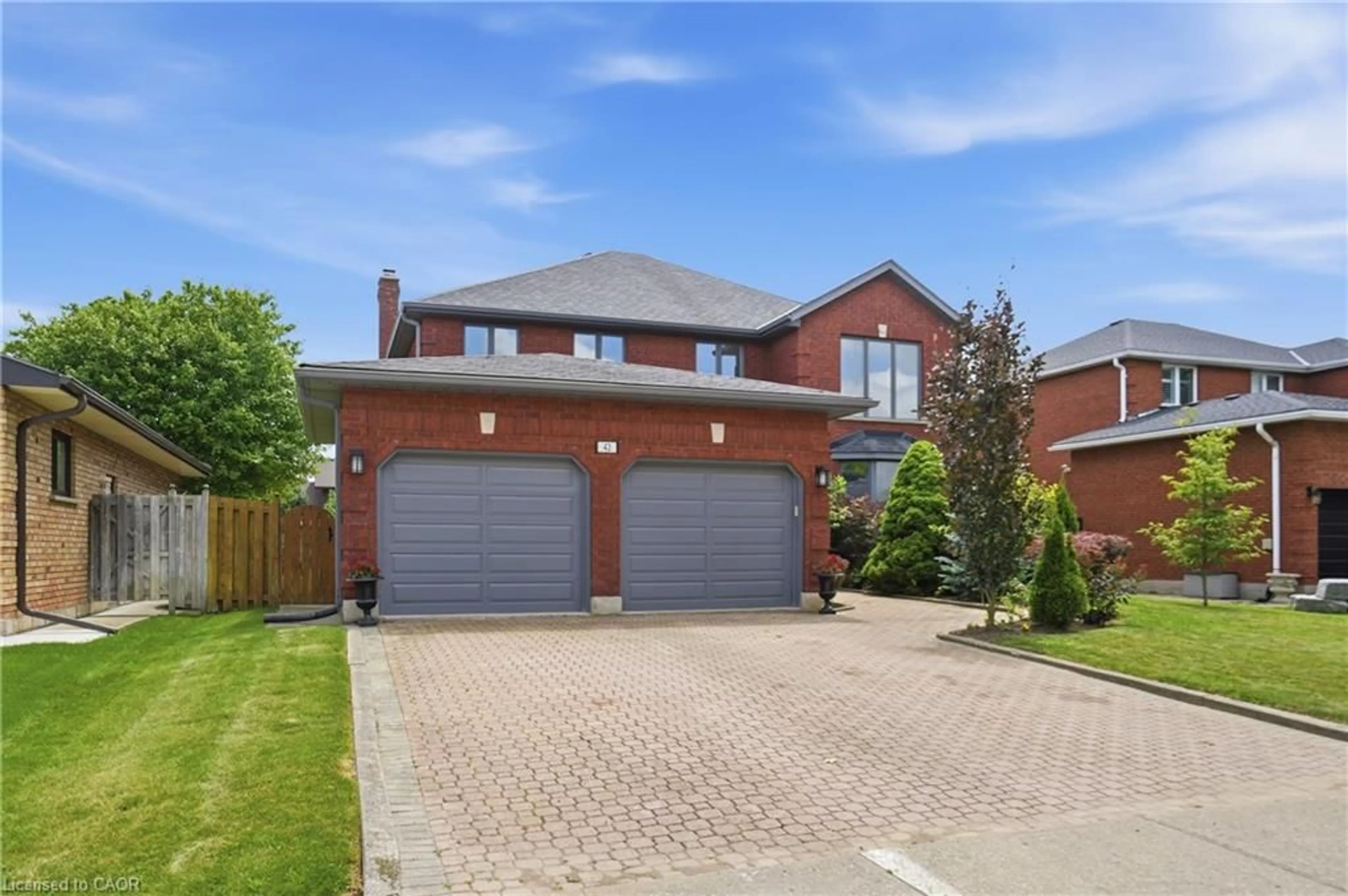 Home with brick exterior material, street for 42 Fox Run, Brantford Ontario N3R 7P7