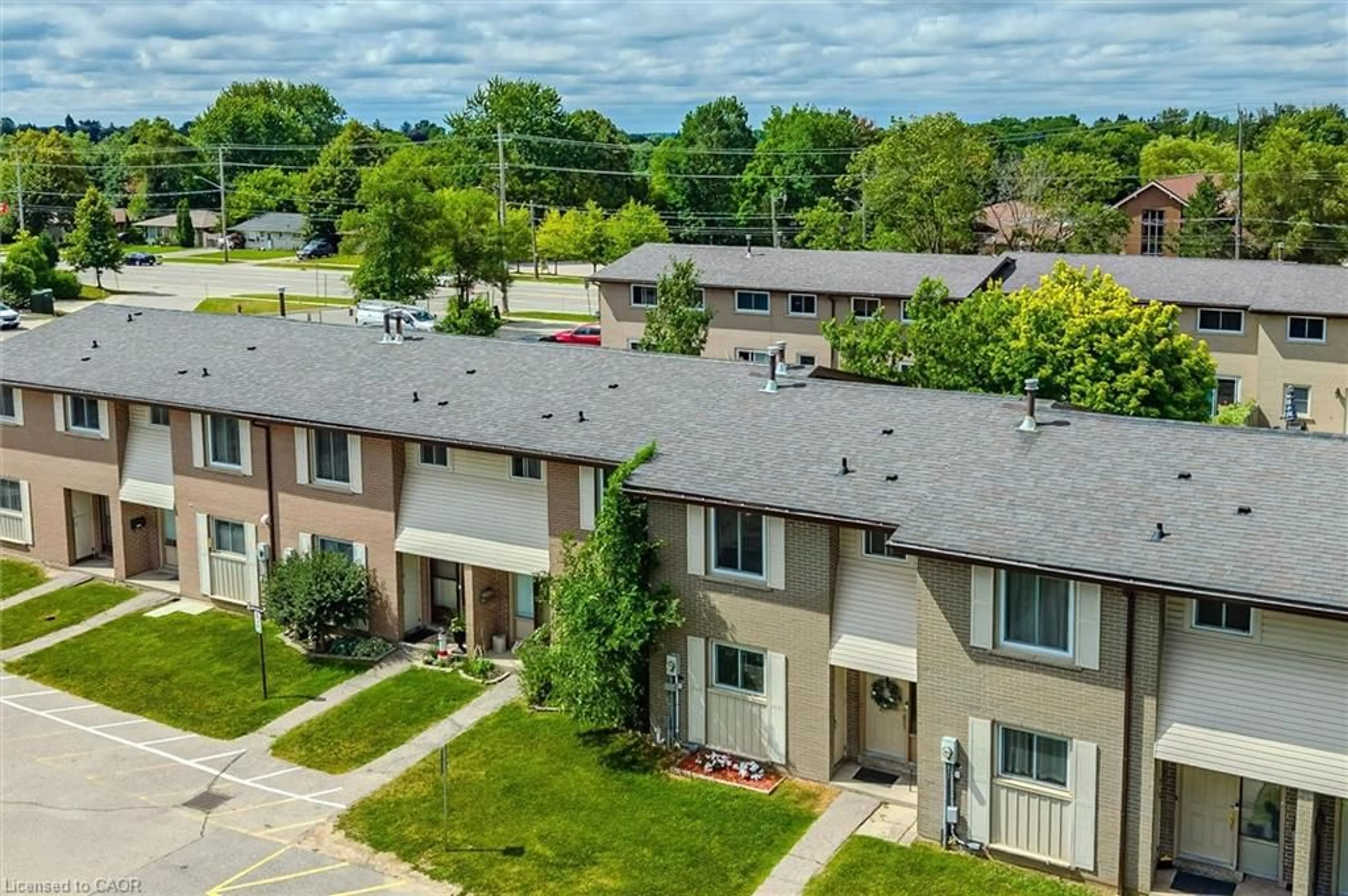 A pic from outside/outdoor area/front of a property/back of a property/a pic from drone, unknown for 453 Victoria Rd #A6, Guelph Ontario N1E 5J9