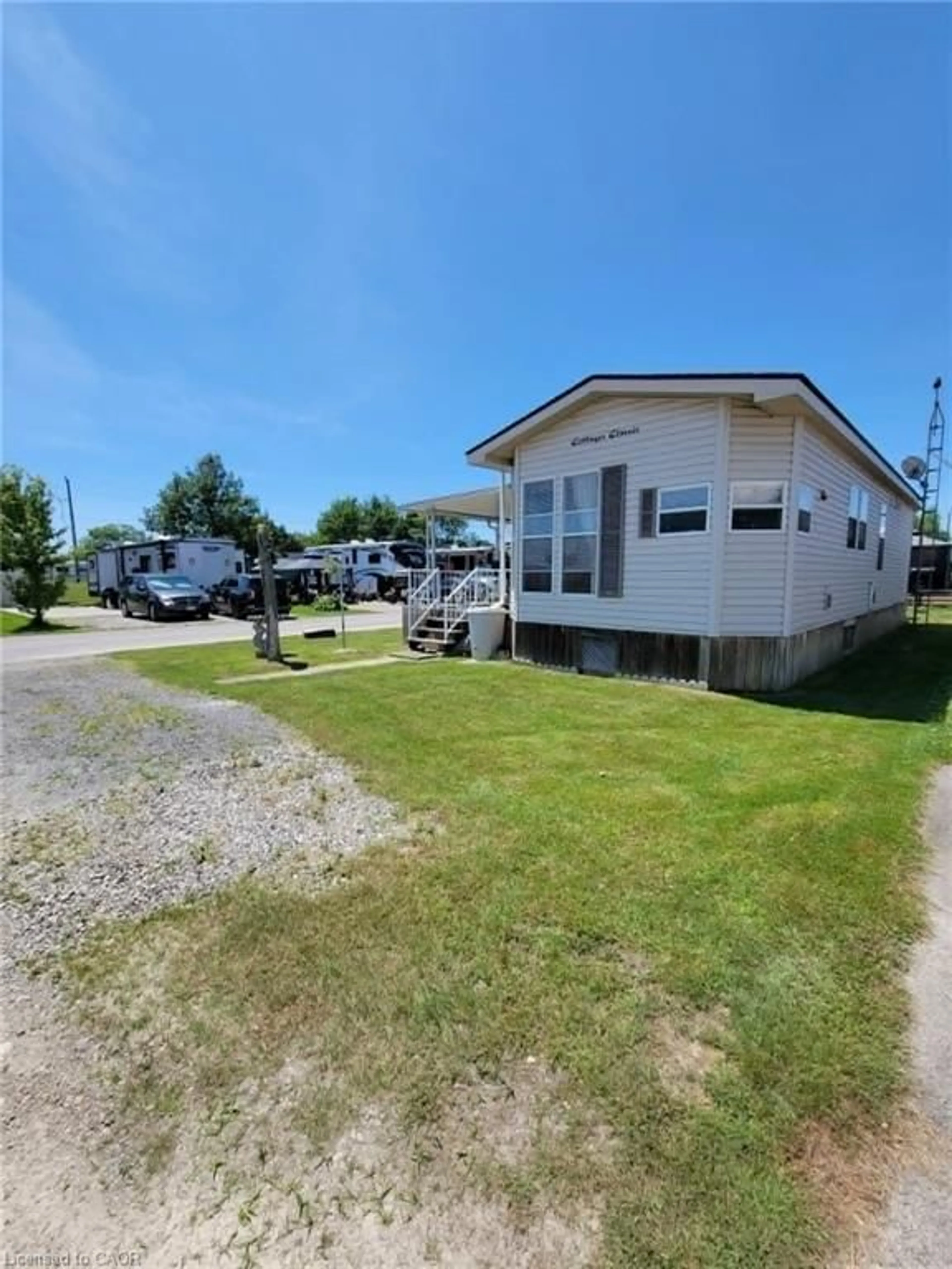 A pic from outside/outdoor area/front of a property/back of a property/a pic from drone, street for 659 Port Maitland Rd #85, Dunnville Ontario N1A 2W6