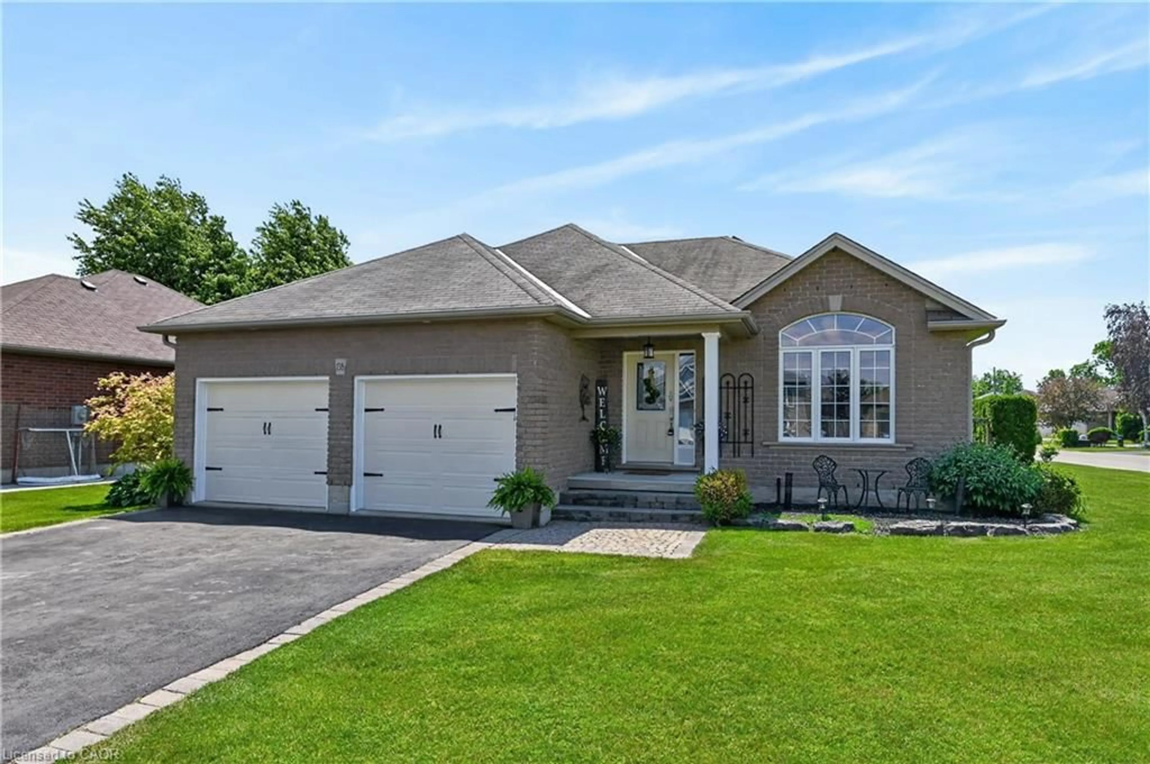 Home with brick exterior material, street for 138 Galinee Trail, Port Dover Ontario N0A 1N9