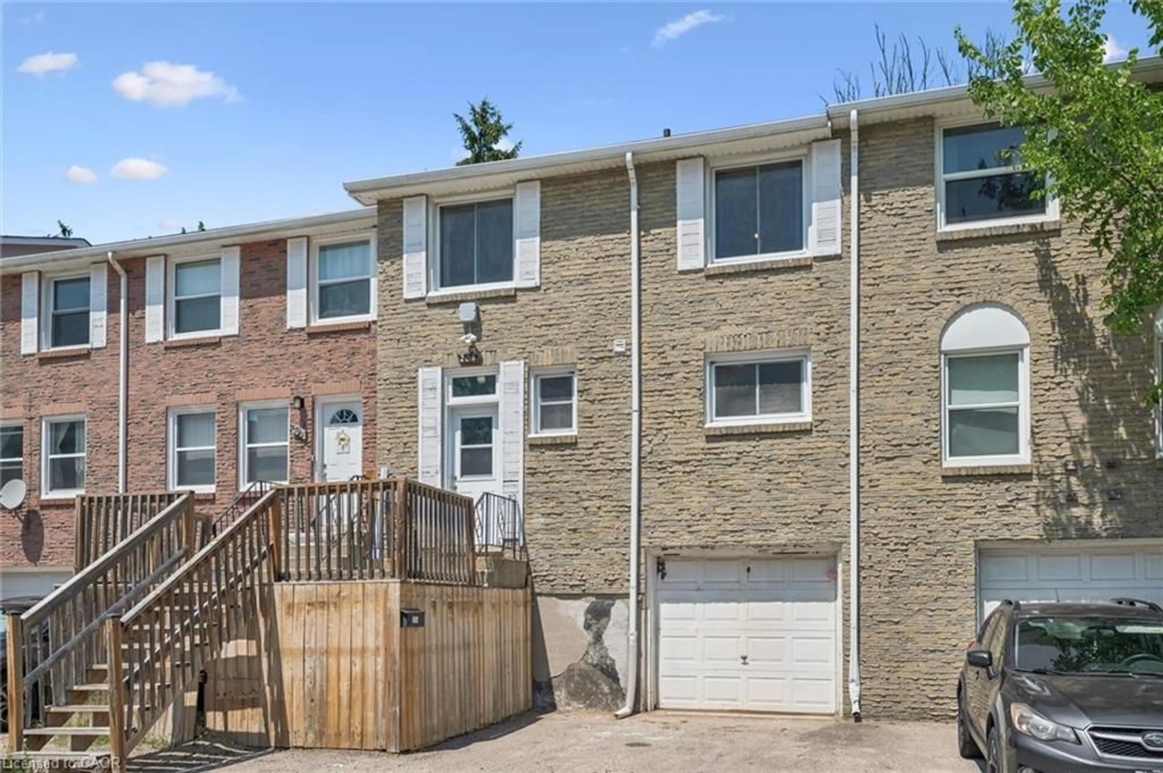 Home with brick exterior material, street for 204 Westcourt Pl, Waterloo Ontario N2L 2R7