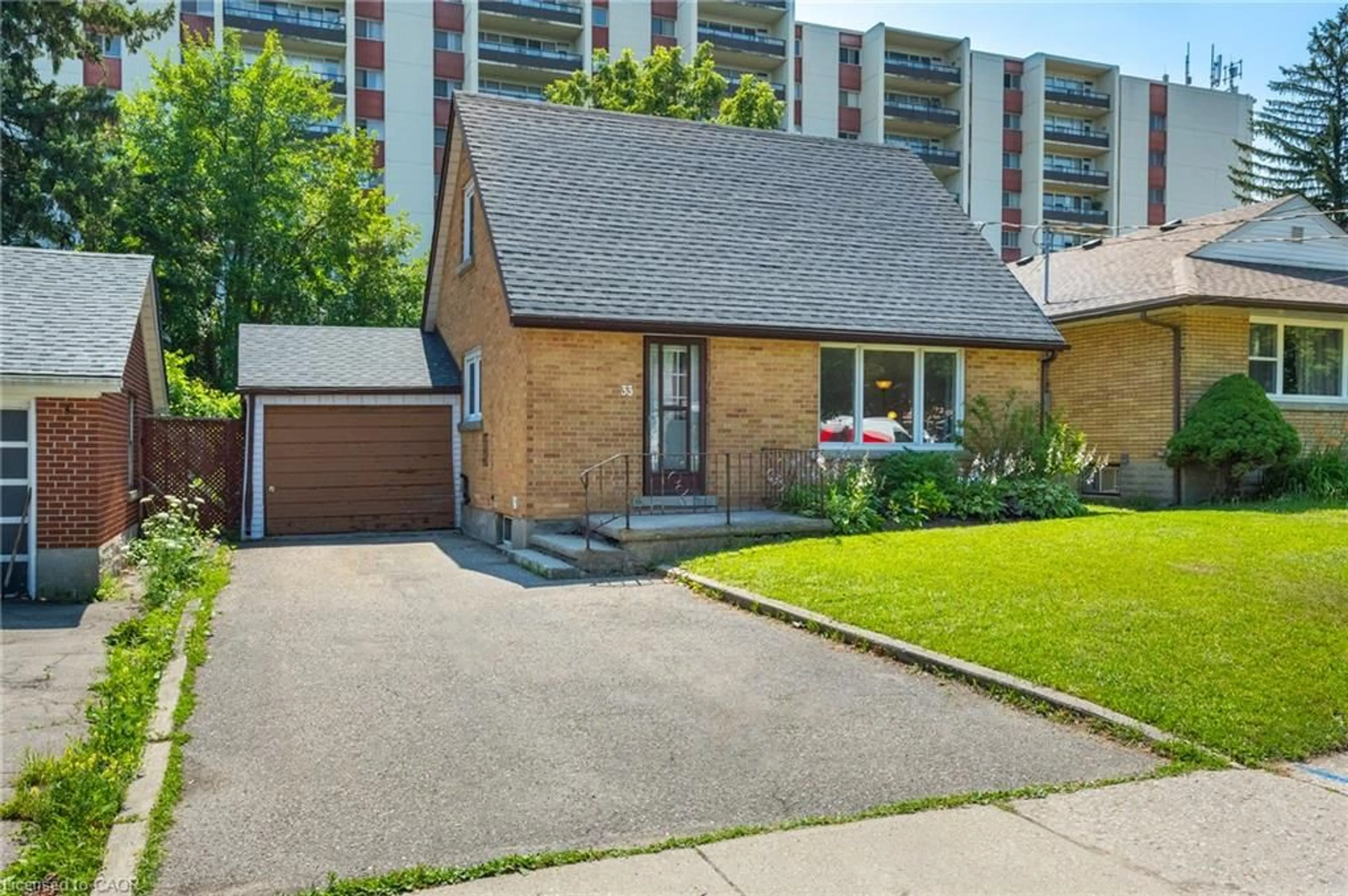 Home with brick exterior material, street for 33 Belmont Ave, Kitchener Ontario N2M 4B8