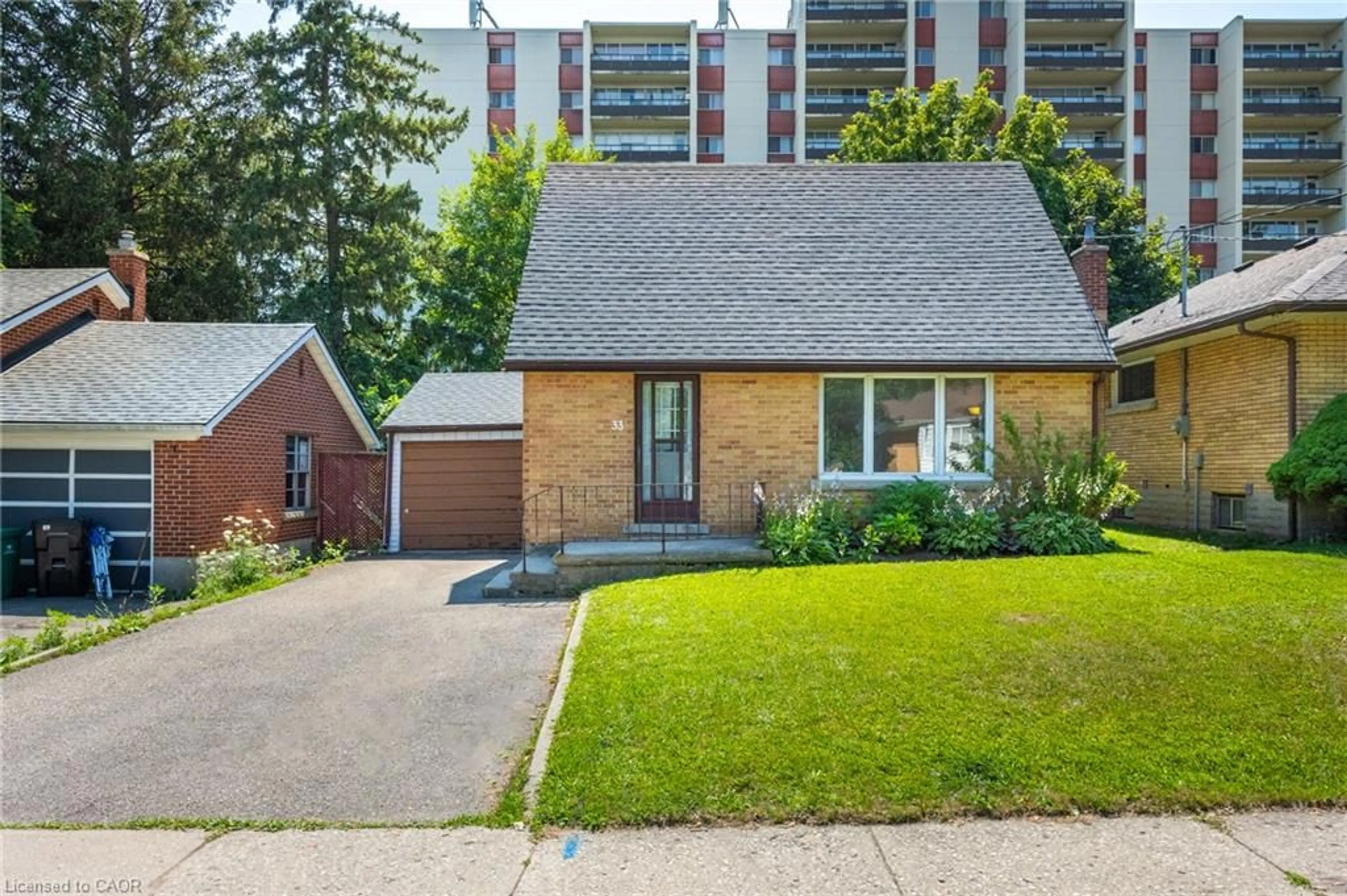 Home with brick exterior material, street for 33 Belmont Ave, Kitchener Ontario N2M 4B8