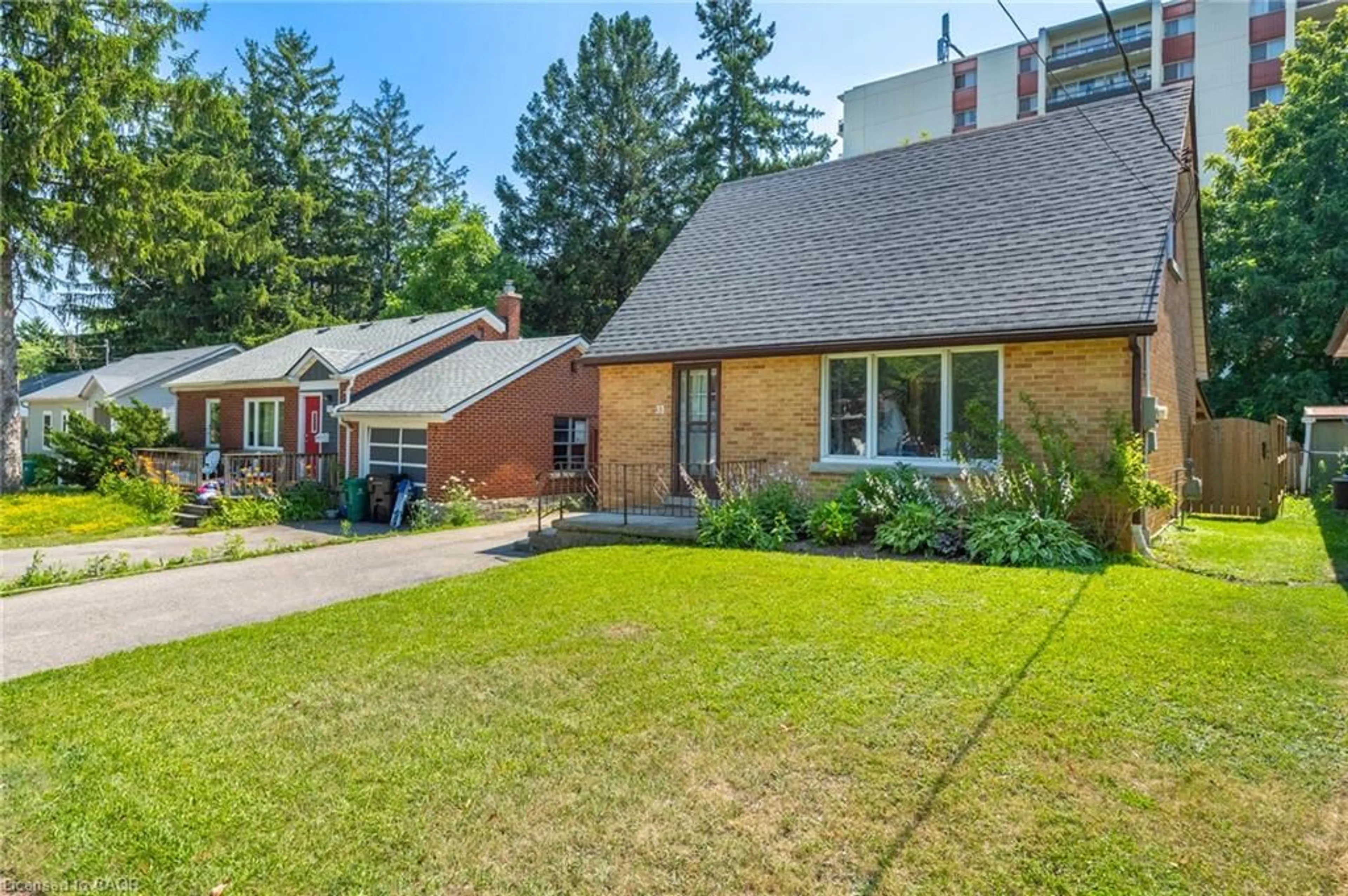 Home with brick exterior material, street for 33 Belmont Ave, Kitchener Ontario N2M 4B8