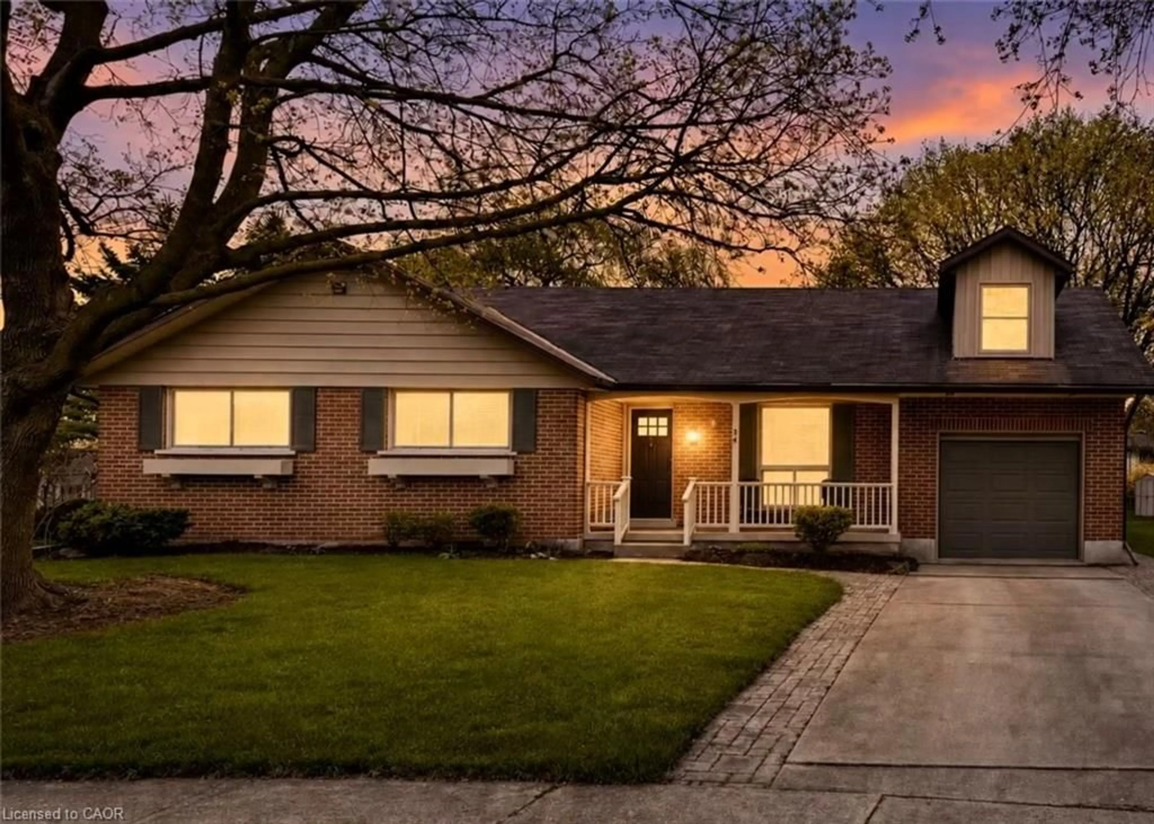 Home with brick exterior material, street for 34 Yule Pl, Kitchener Ontario N2B 2J8