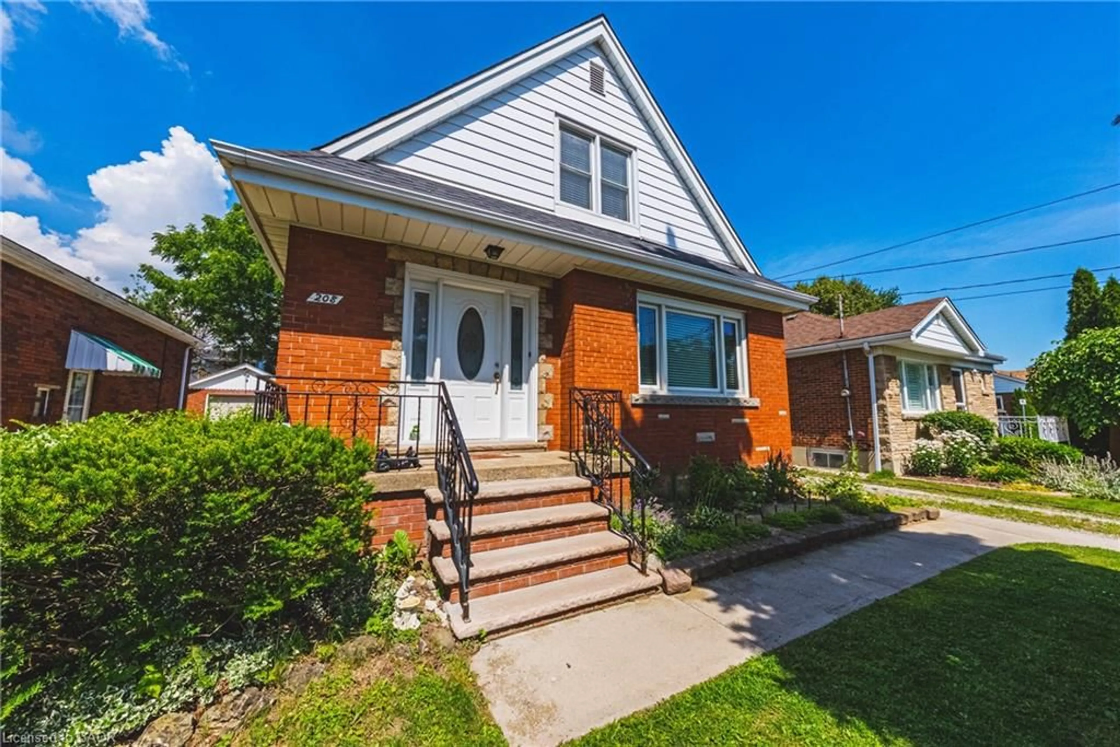 Home with brick exterior material, street for 208 Glencarry Ave, Hamilton Ontario L8K 3R9