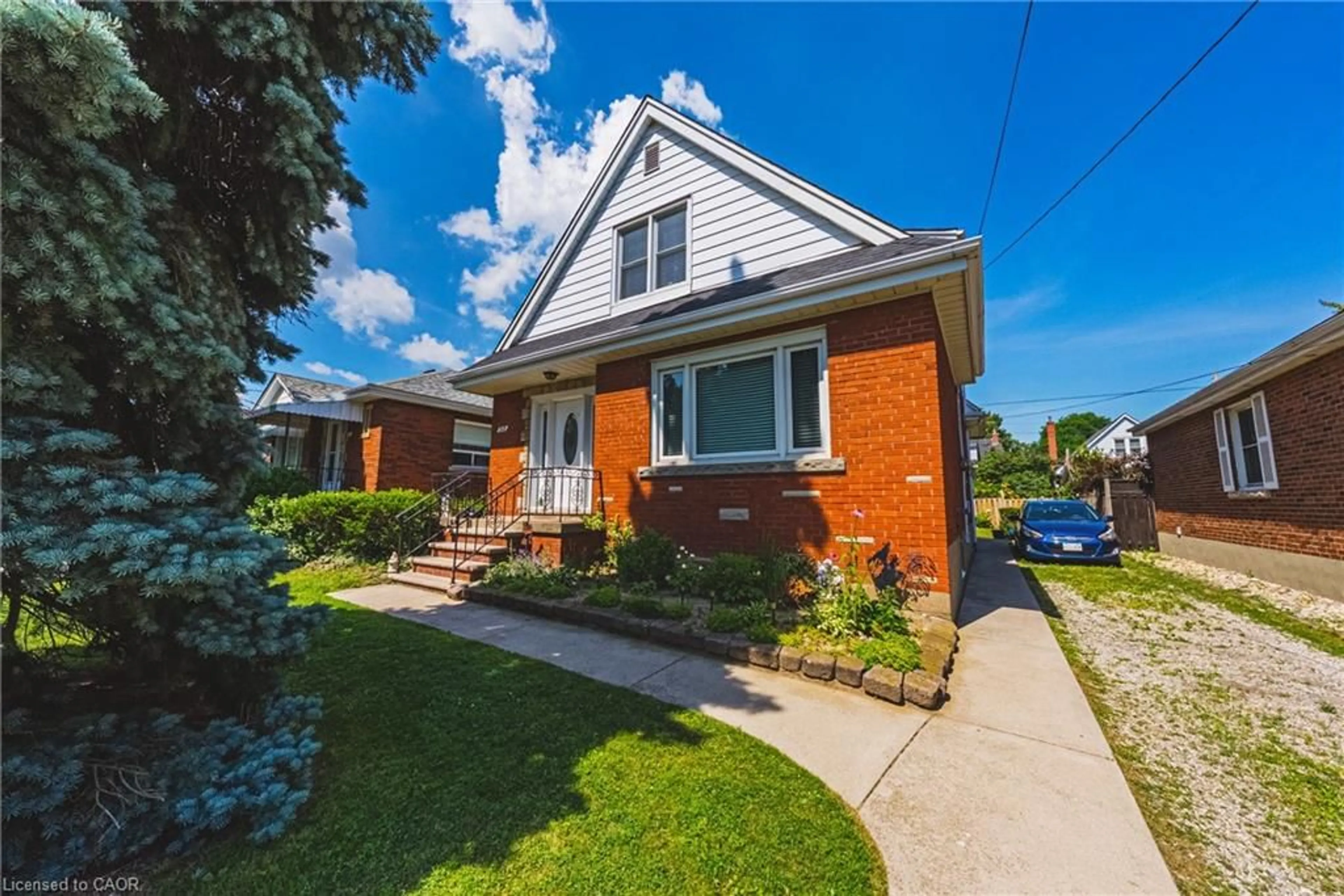 Home with brick exterior material, street for 208 Glencarry Ave, Hamilton Ontario L8K 3R9