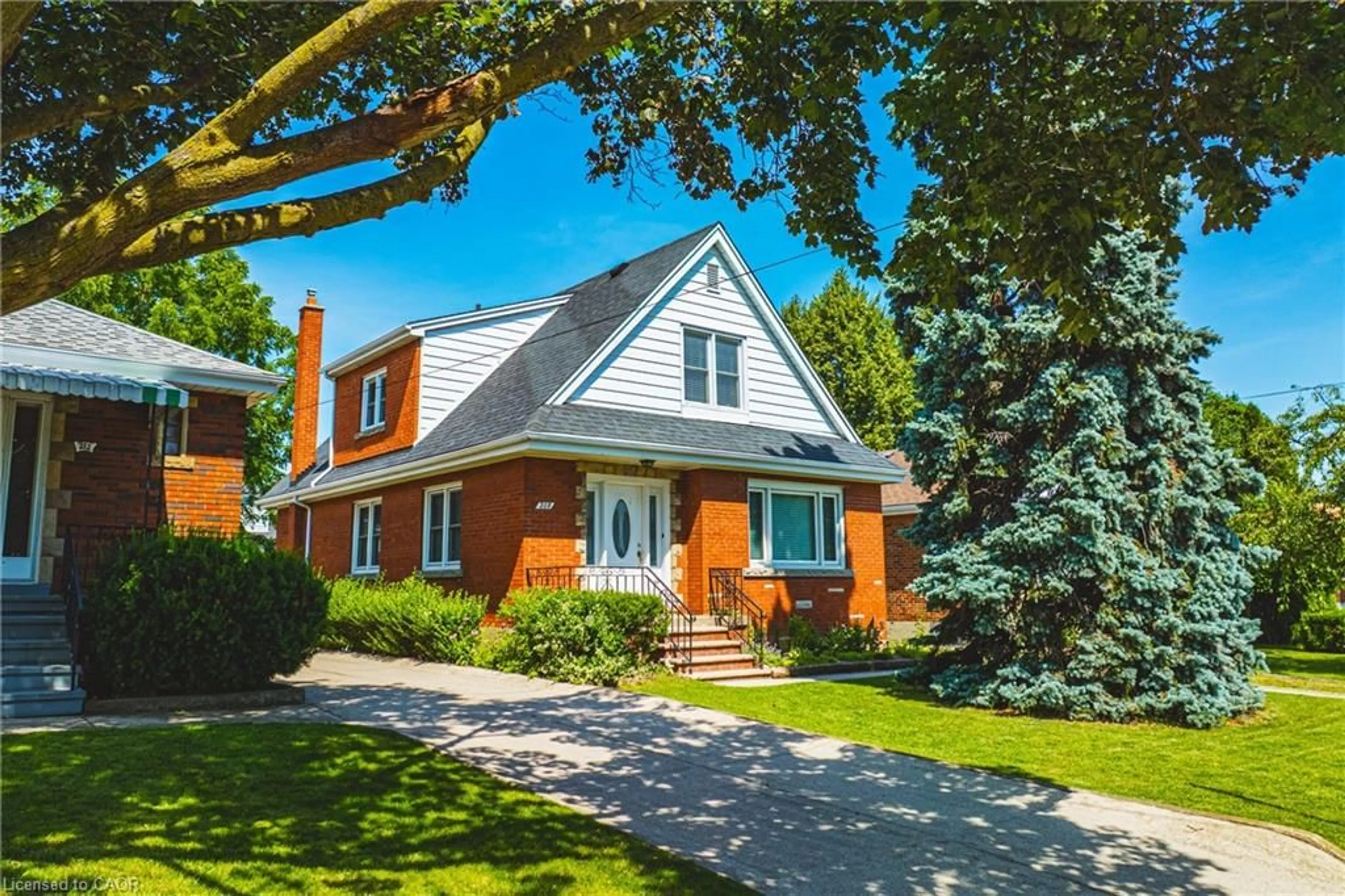 Home with brick exterior material, street for 208 Glencarry Ave, Hamilton Ontario L8K 3R9