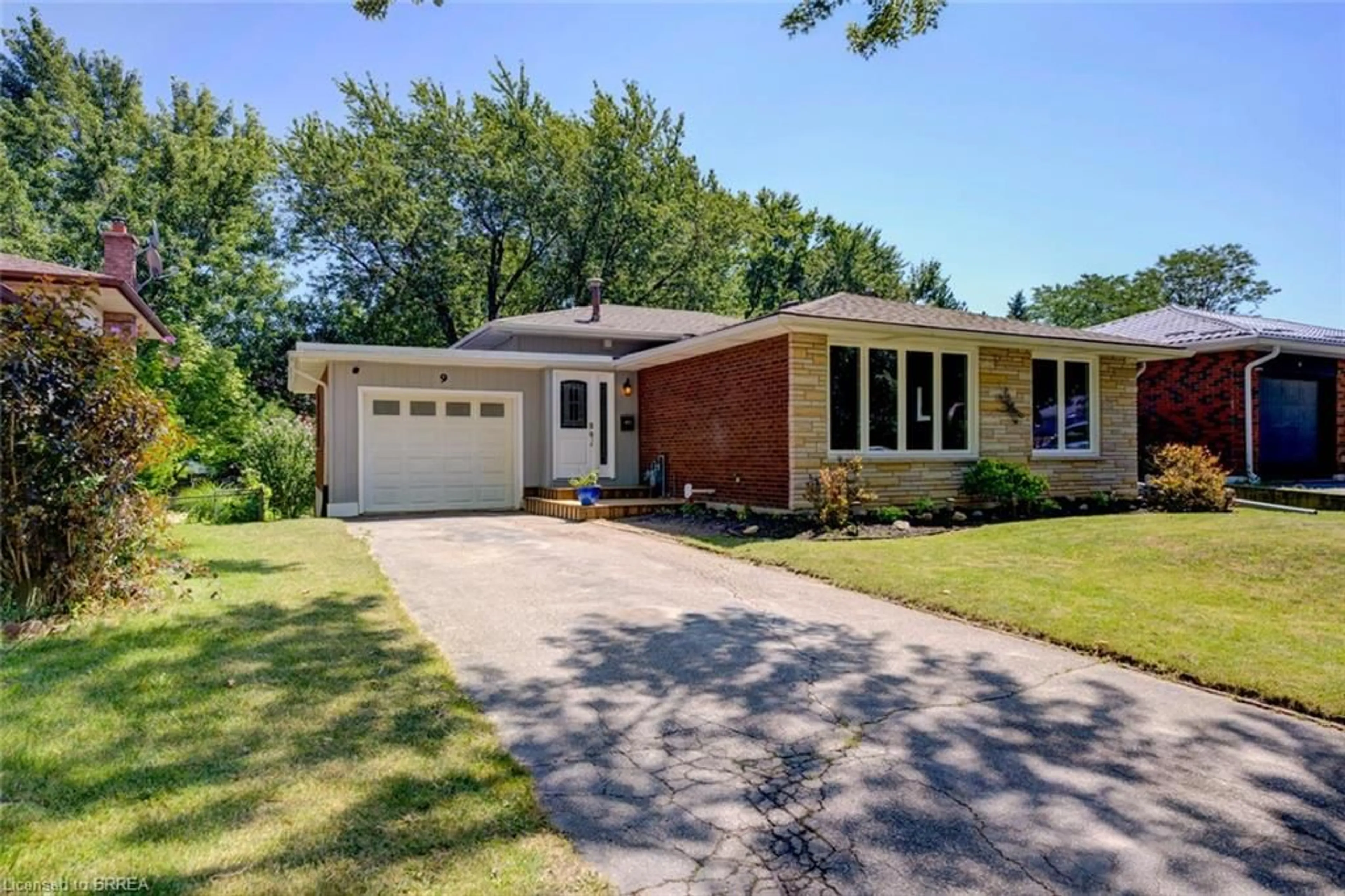 Home with brick exterior material, street for 9 Winding Way, Brantford Ontario N3R 3S1