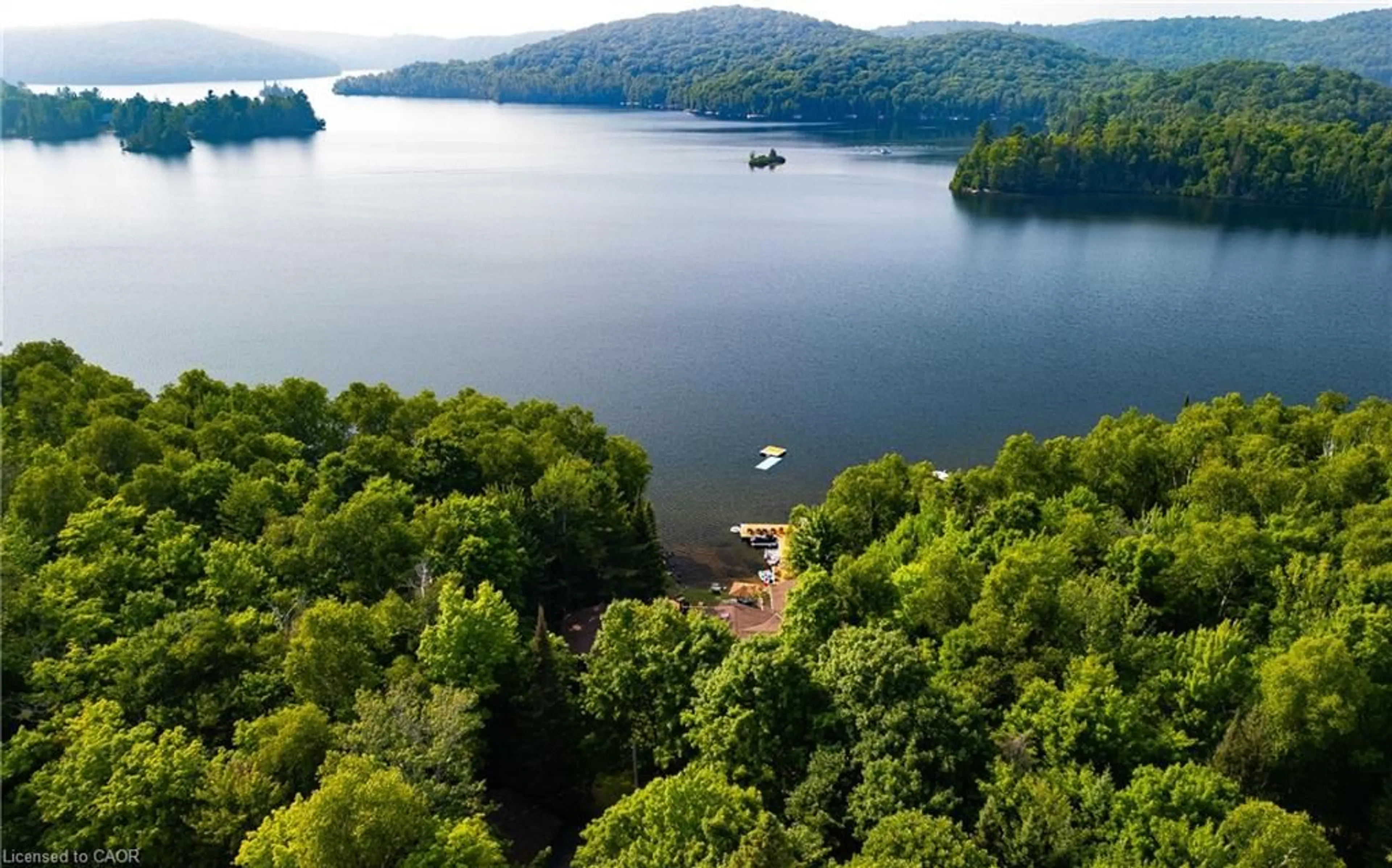 A pic from outside/outdoor area/front of a property/back of a property/a pic from drone, water/lake/river/ocean view for 57 Lake Haven Dr, Kearney Ontario P0A 1Z0