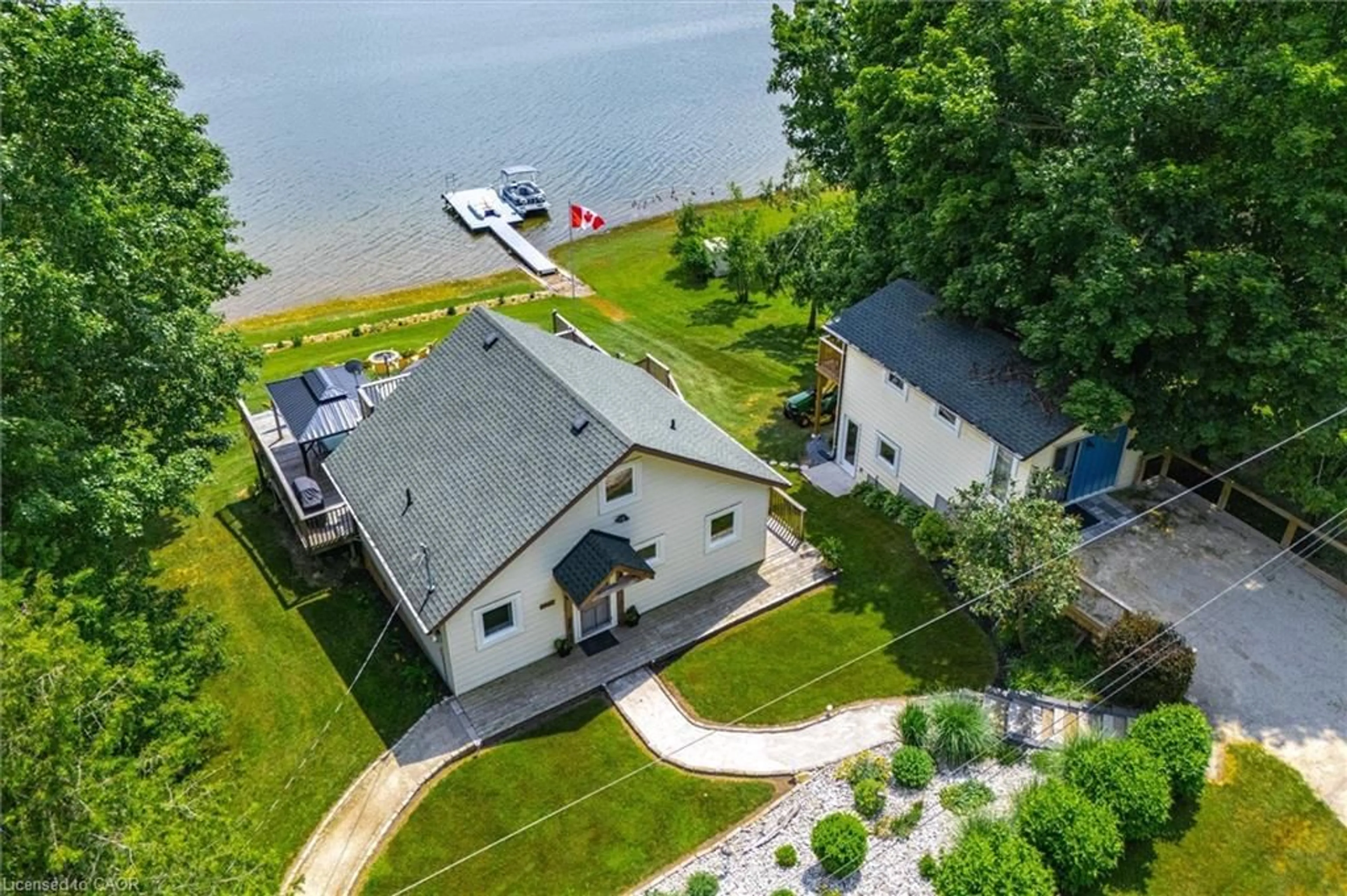 A pic from outside/outdoor area/front of a property/back of a property/a pic from drone, water/lake/river/ocean view for 614 Sixth Rd, Mapleton Ontario N0G 2K0