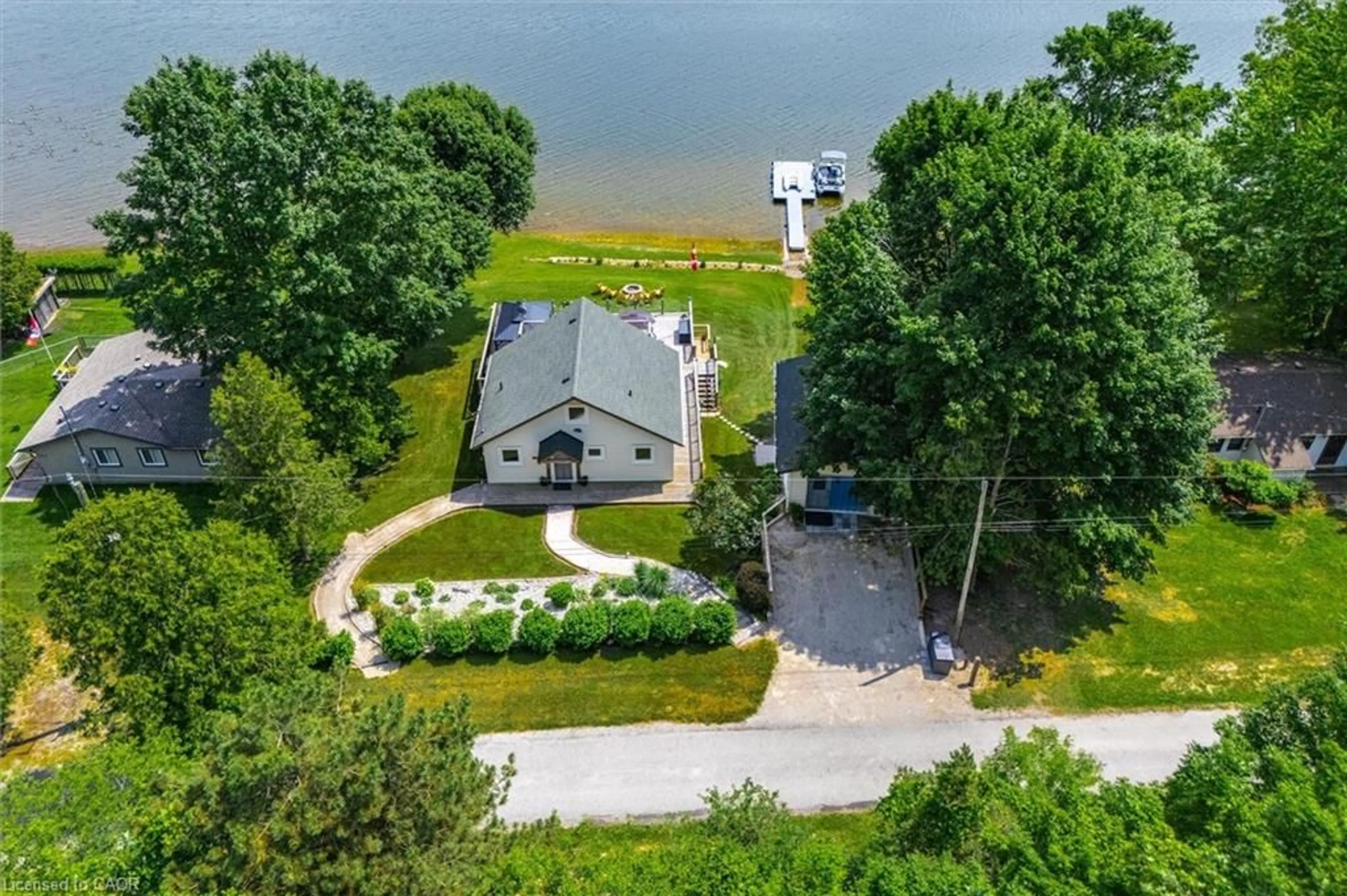 A pic from outside/outdoor area/front of a property/back of a property/a pic from drone, water/lake/river/ocean view for 614 Sixth Rd, Mapleton Ontario N0G 2K0