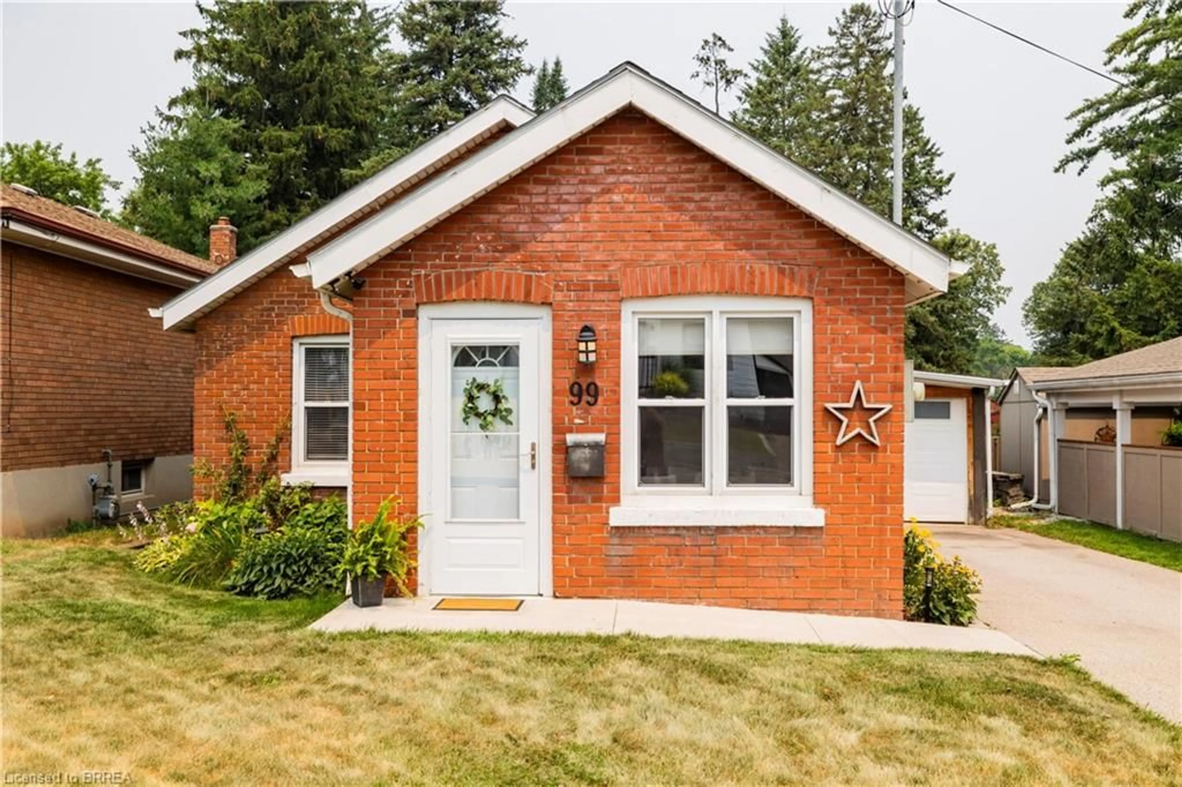 Home with brick exterior material, street for 99 Morton Ave, Brantford Ontario N3R 2N9