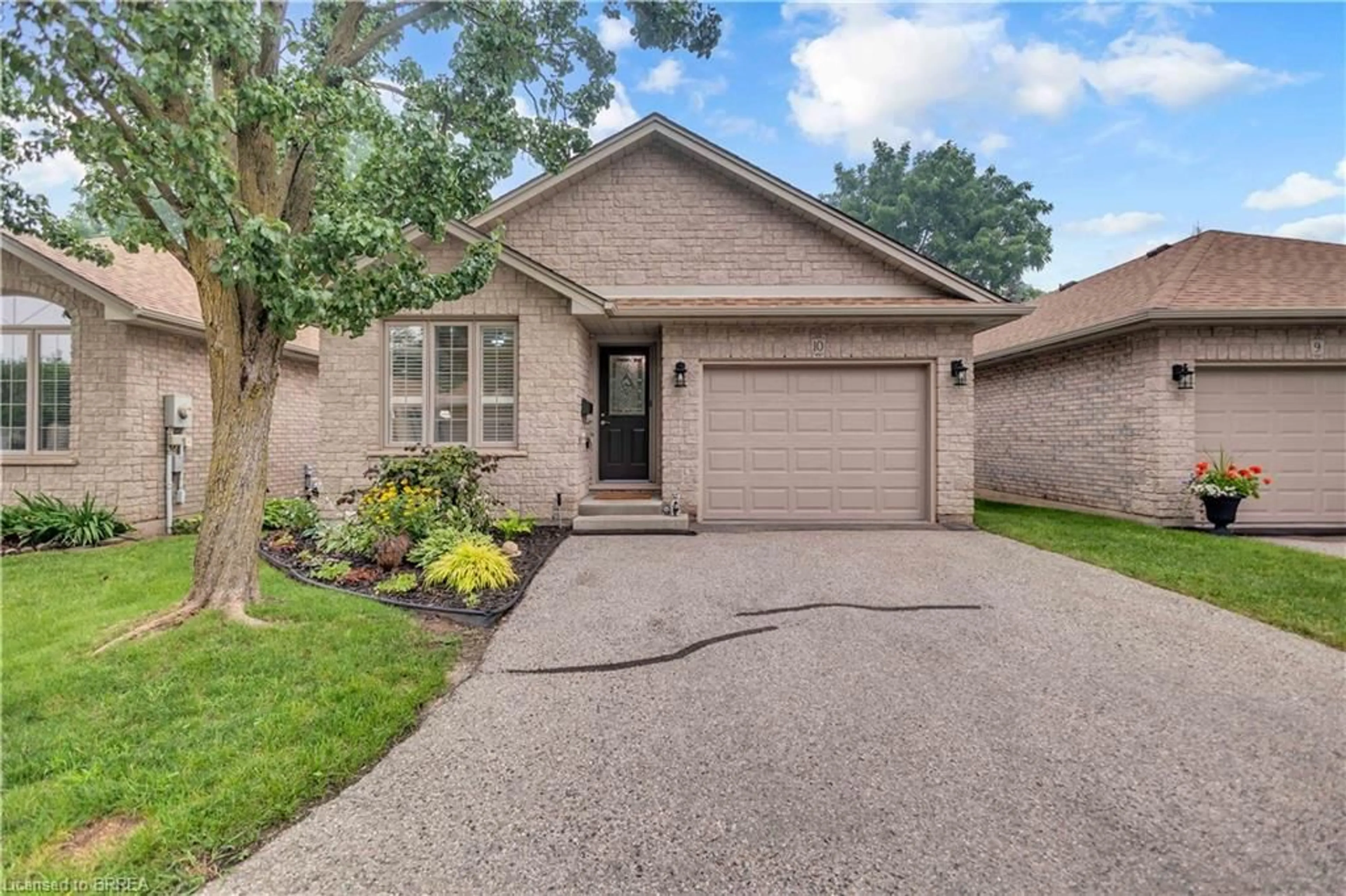 Home with brick exterior material, street for 73 Morton Ave #10, Brantford Ontario N3R 2N7