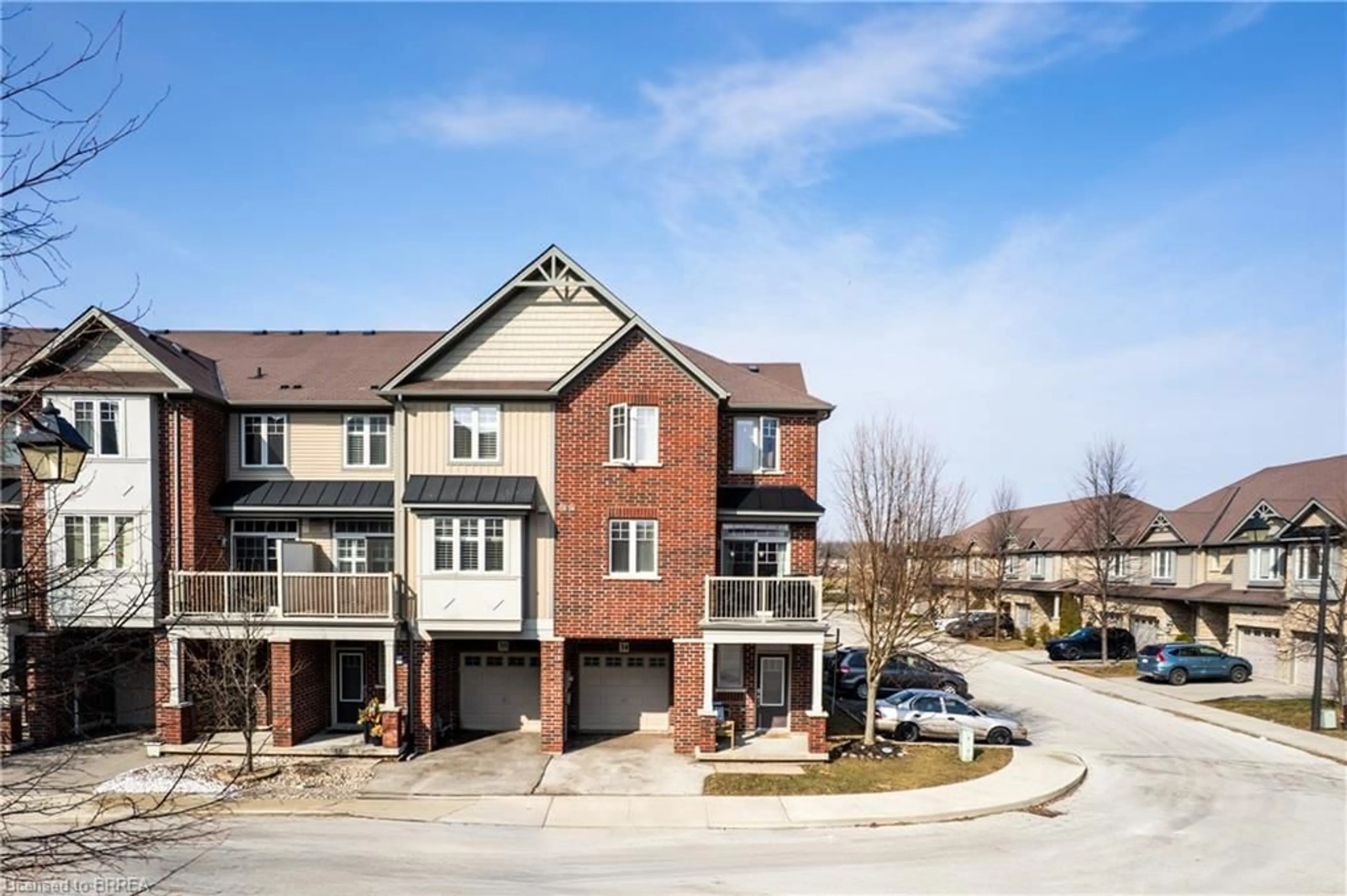 A pic from outside/outdoor area/front of a property/back of a property/a pic from drone, street for 310 Fall Fair Way #34, Binbrook Ontario L0R 1C0