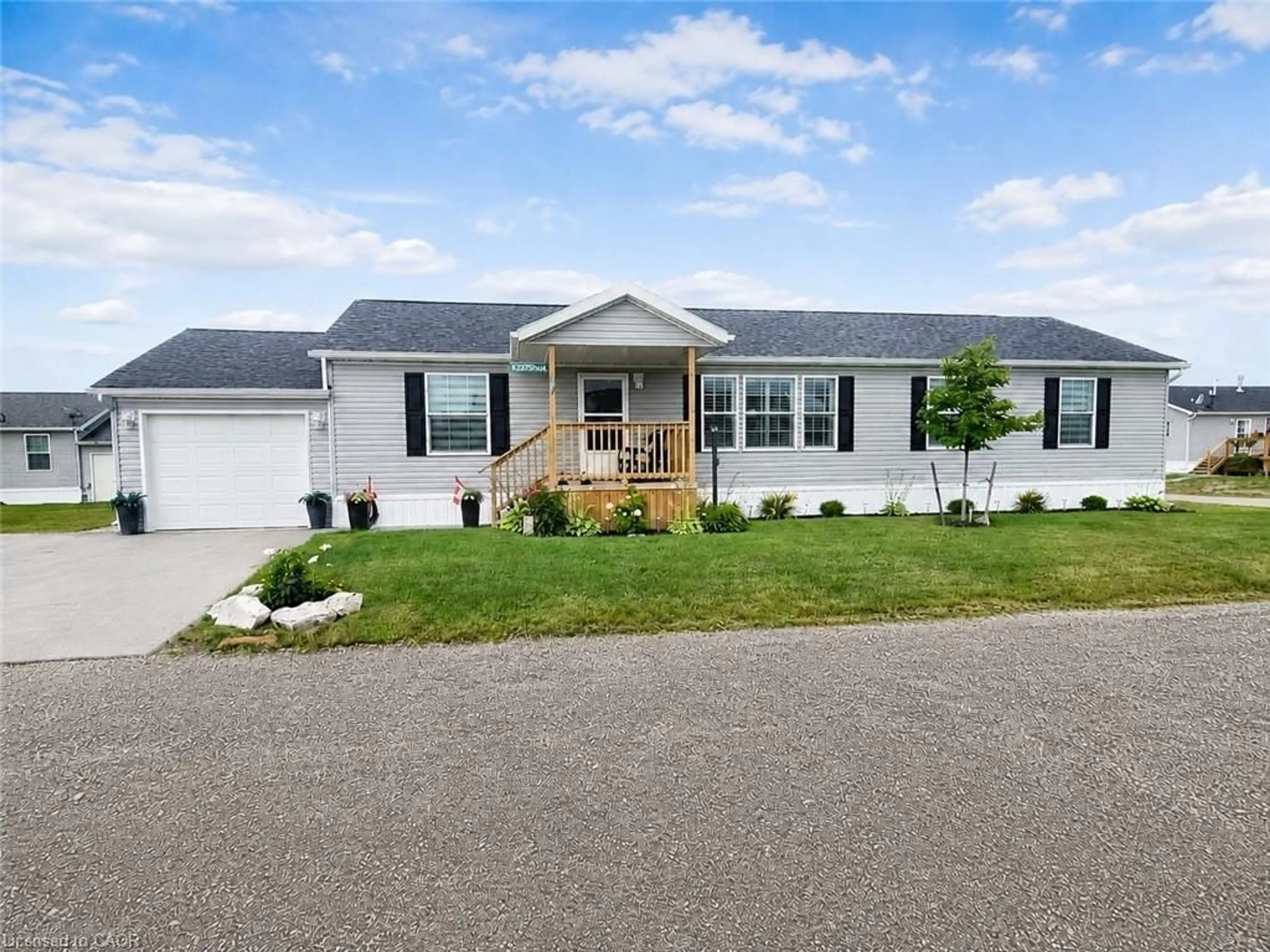 Home with vinyl exterior material, street for 13 Hickory Hollow, Nanticoke Ontario N0A 1L0