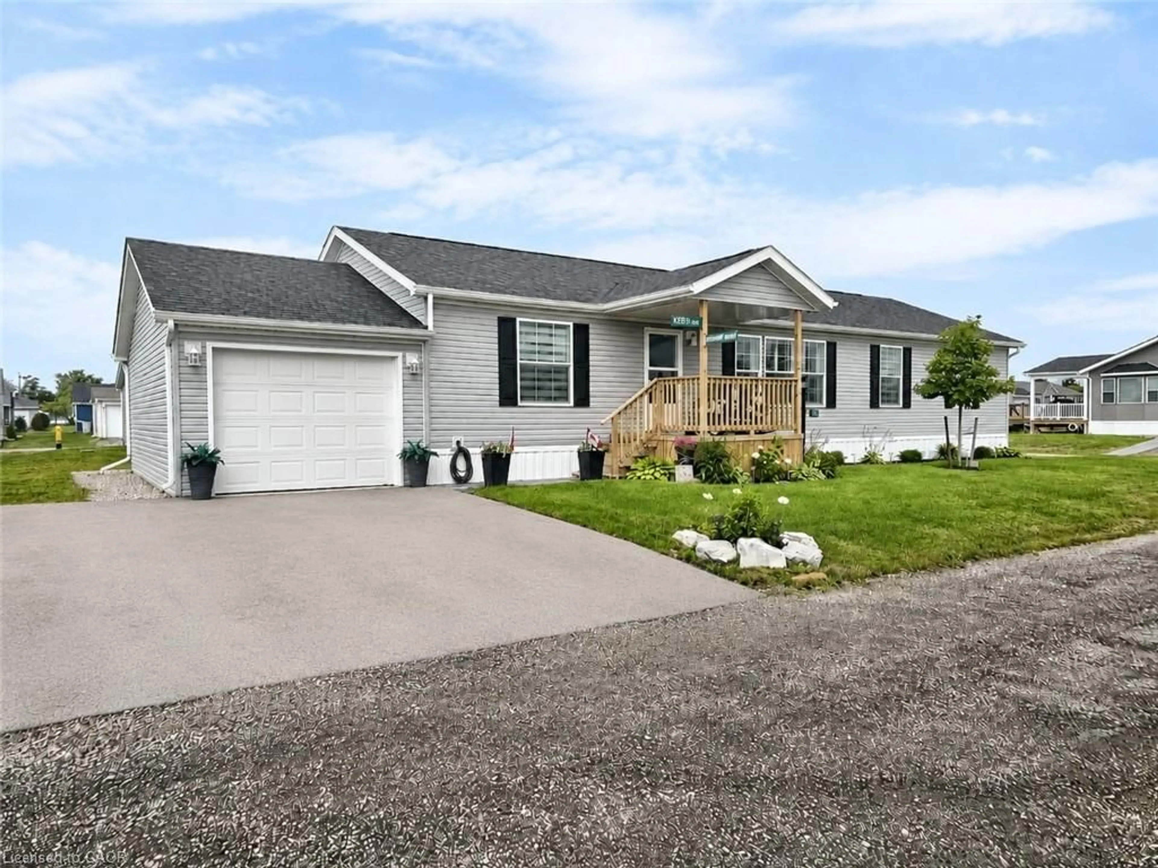 Home with vinyl exterior material, street for 13 Hickory Hollow, Nanticoke Ontario N0A 1L0