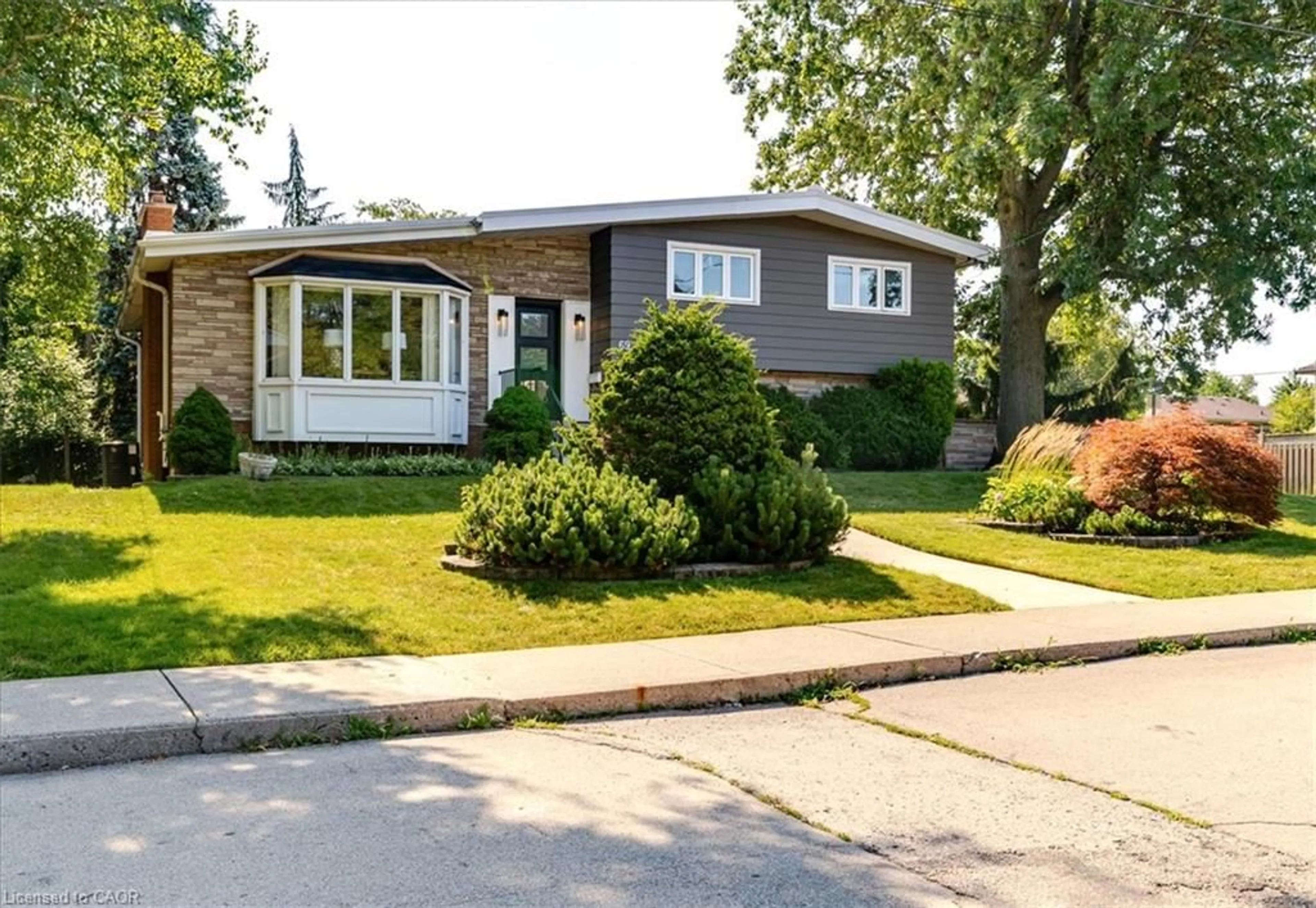 Home with brick exterior material, street for 69 Pleasant Ave, Hamilton Ontario L9C 4M8