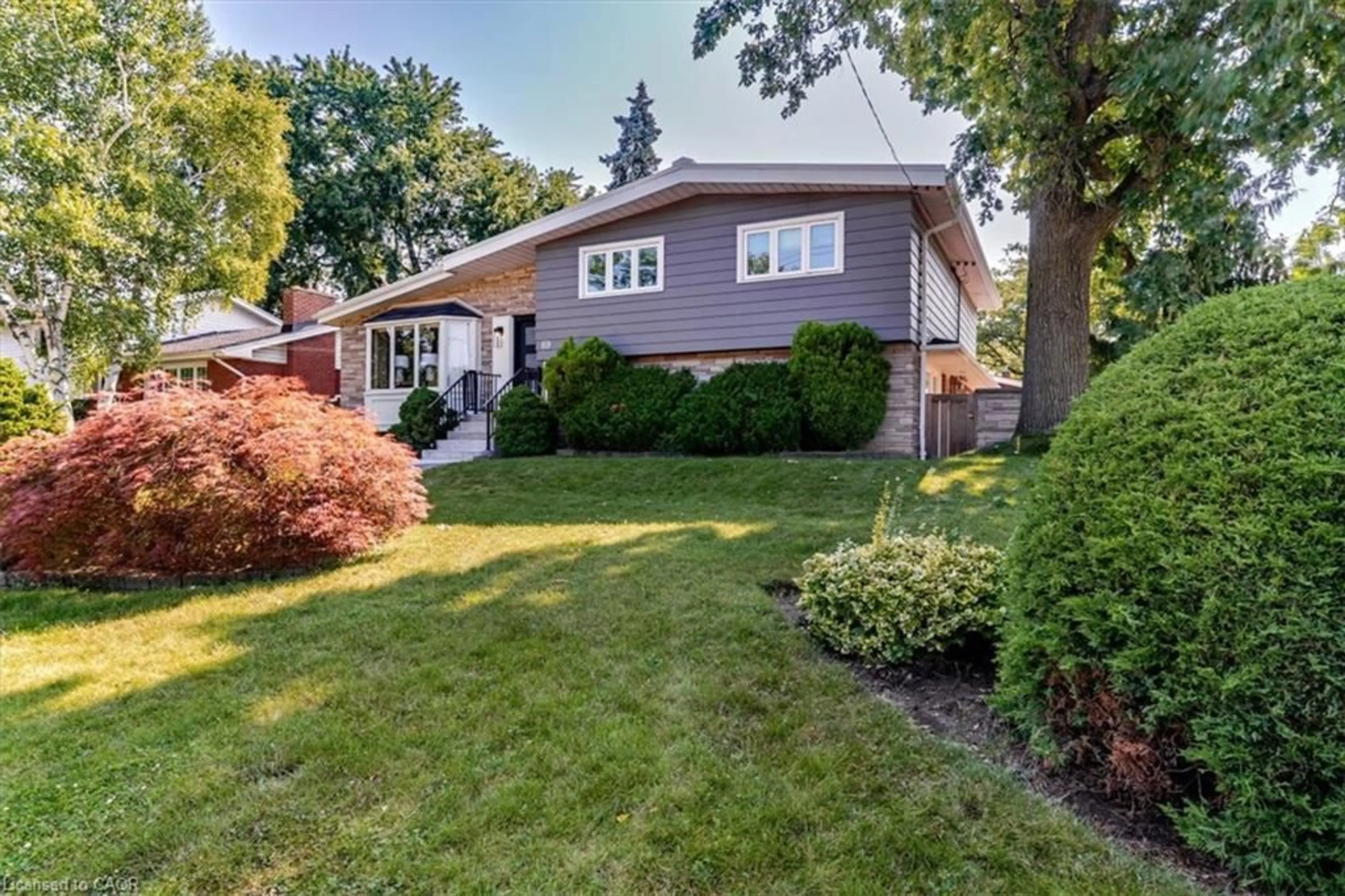 Home with brick exterior material, street for 69 Pleasant Ave, Hamilton Ontario L9C 4M8