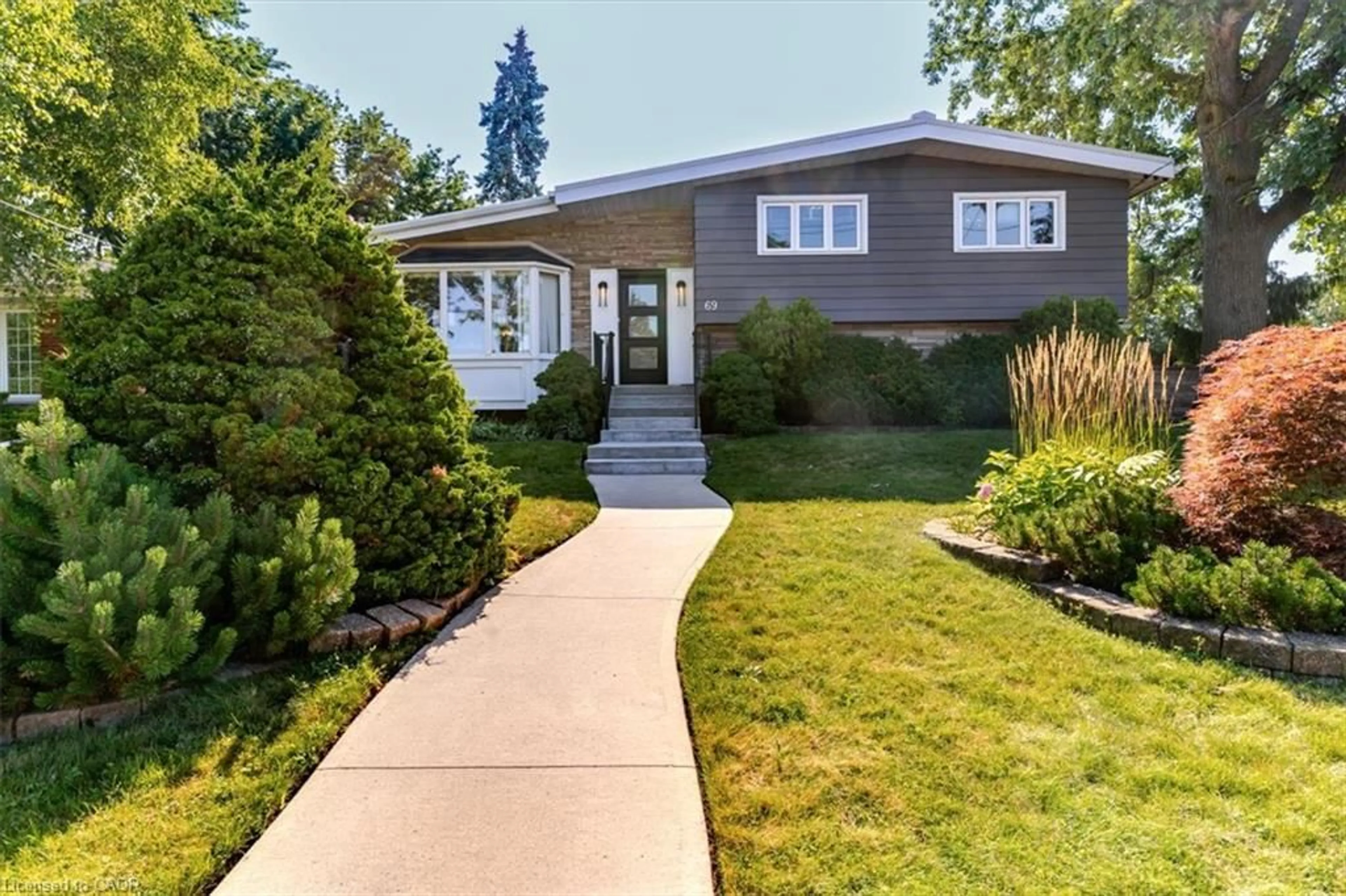 Home with vinyl exterior material, street for 69 Pleasant Ave, Hamilton Ontario L9C 4M8
