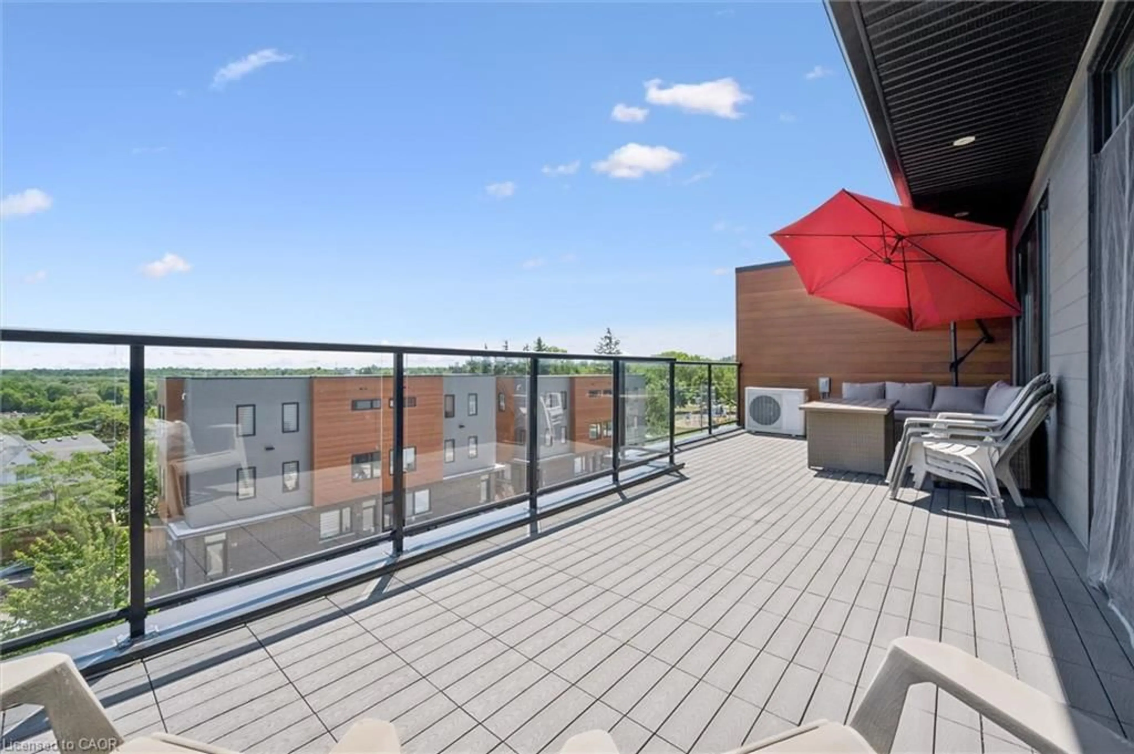 Patio, city buildings view from balcony for 54 Bridge St #12, Kitchener Ontario N2K 0G4