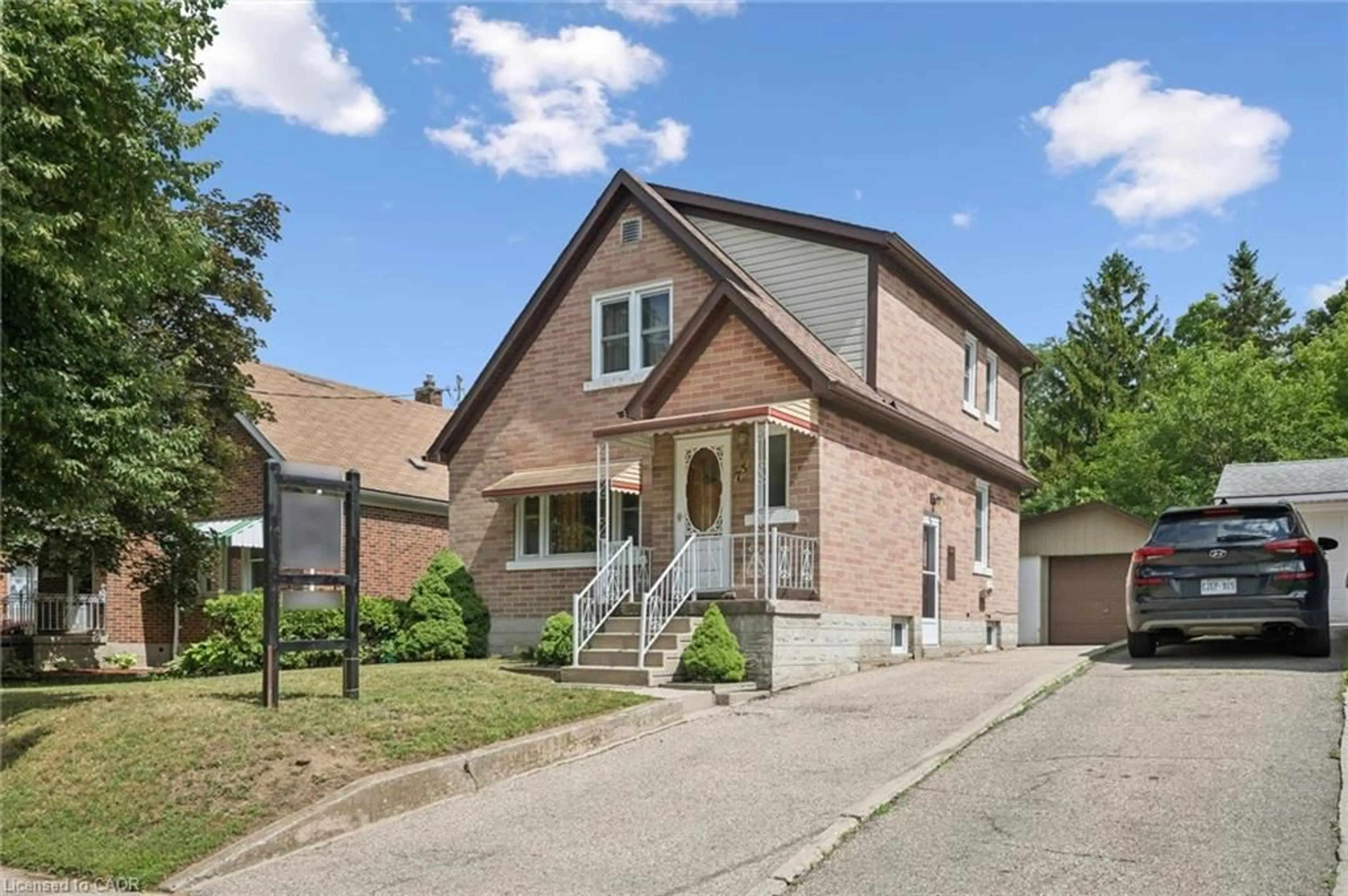 Home with brick exterior material, street for 75 Arnold St, Kitchener Ontario N2H 6C9