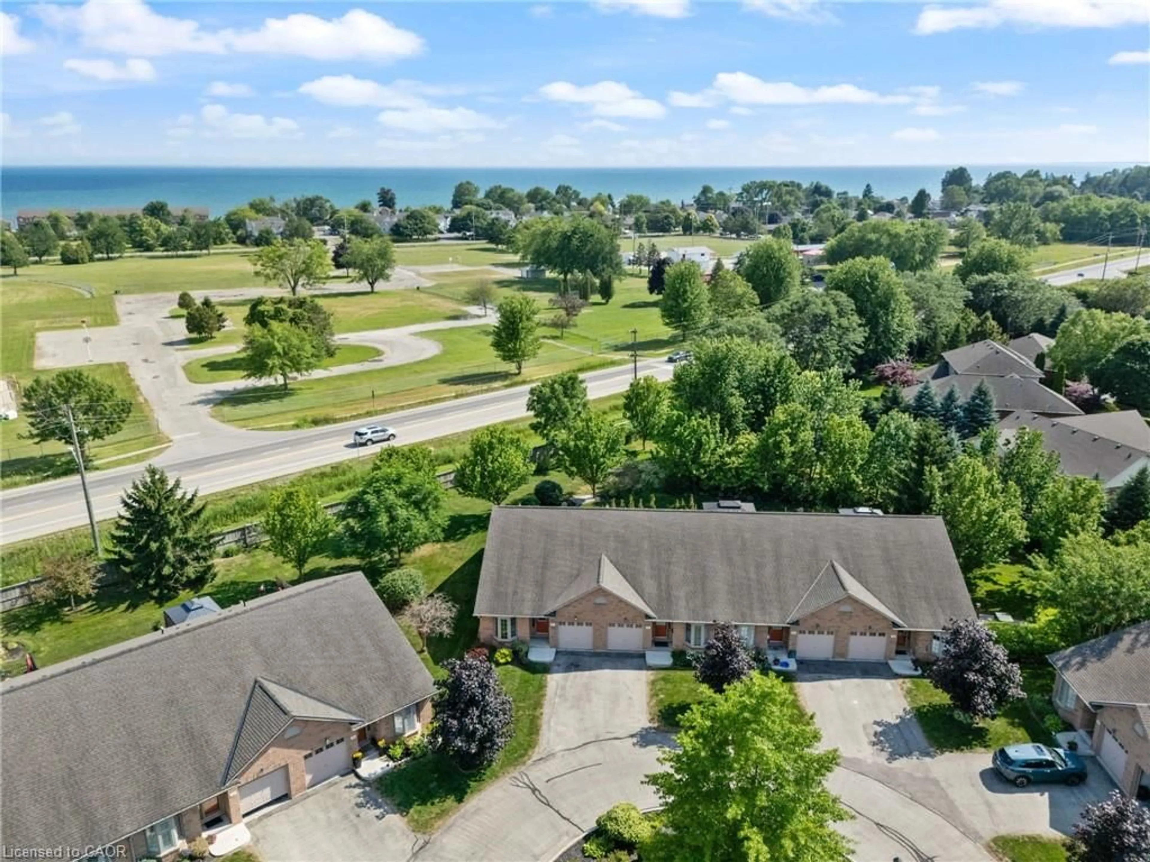 A pic from outside/outdoor area/front of a property/back of a property/a pic from drone, water/lake/river/ocean view for 19 Somerset Dr #16, Port Dover Ontario N0A 1N7