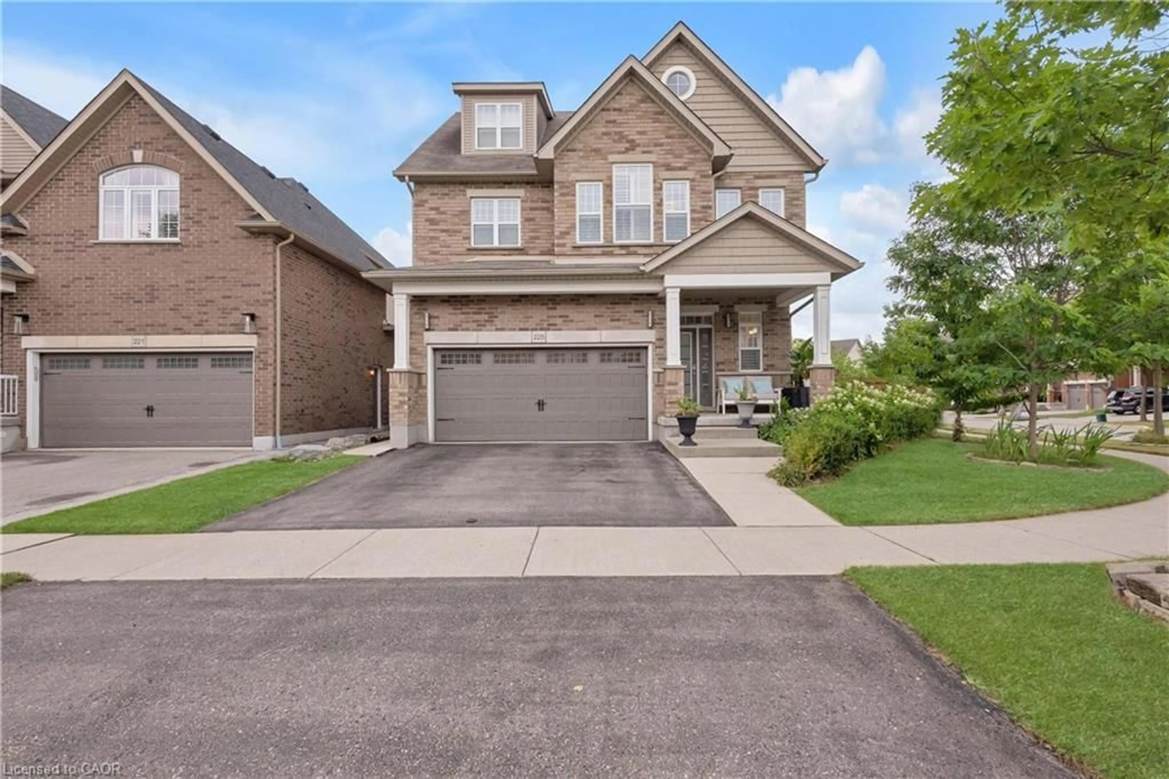 Home with brick exterior material, street for 225 Tremaine Cres, Kitchener Ontario N2A 4L9