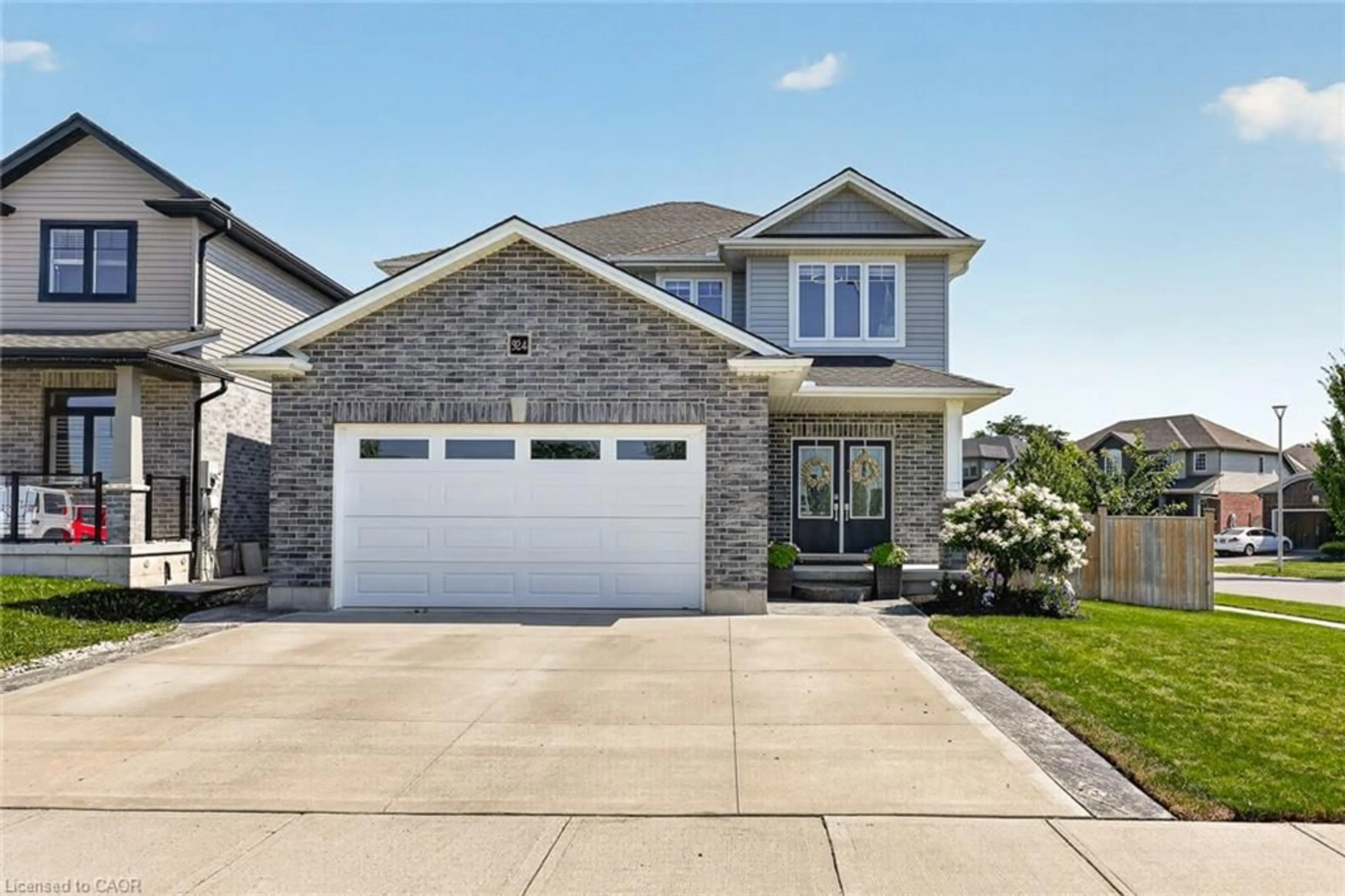 Home with brick exterior material, street for 924 Springbank Ave, Woodstock Ontario N4T 0G1