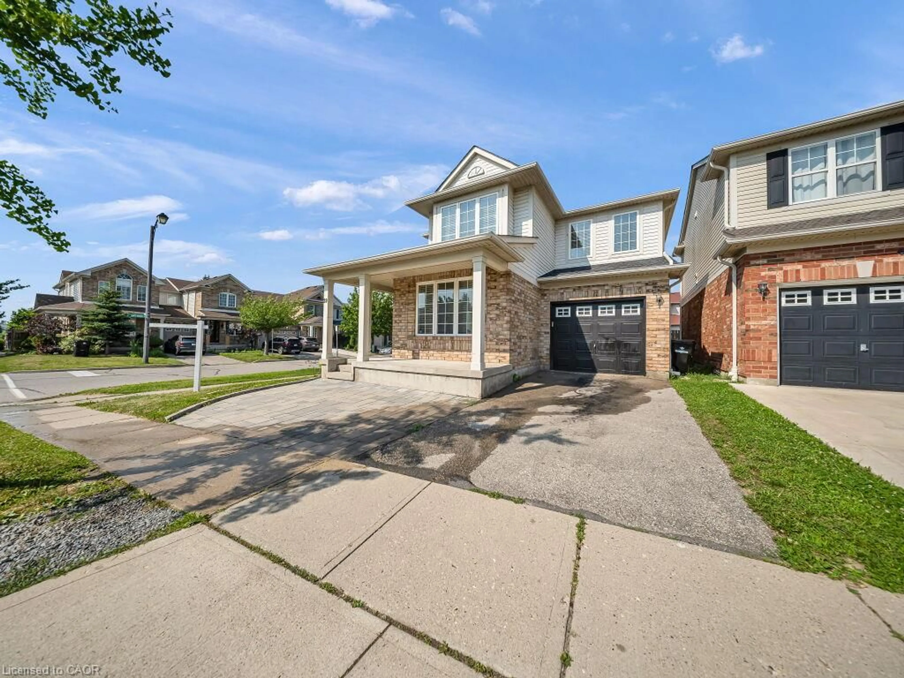 Home with brick exterior material, street for 39 Baintree Way, Cambridge Ontario N1T 2H3