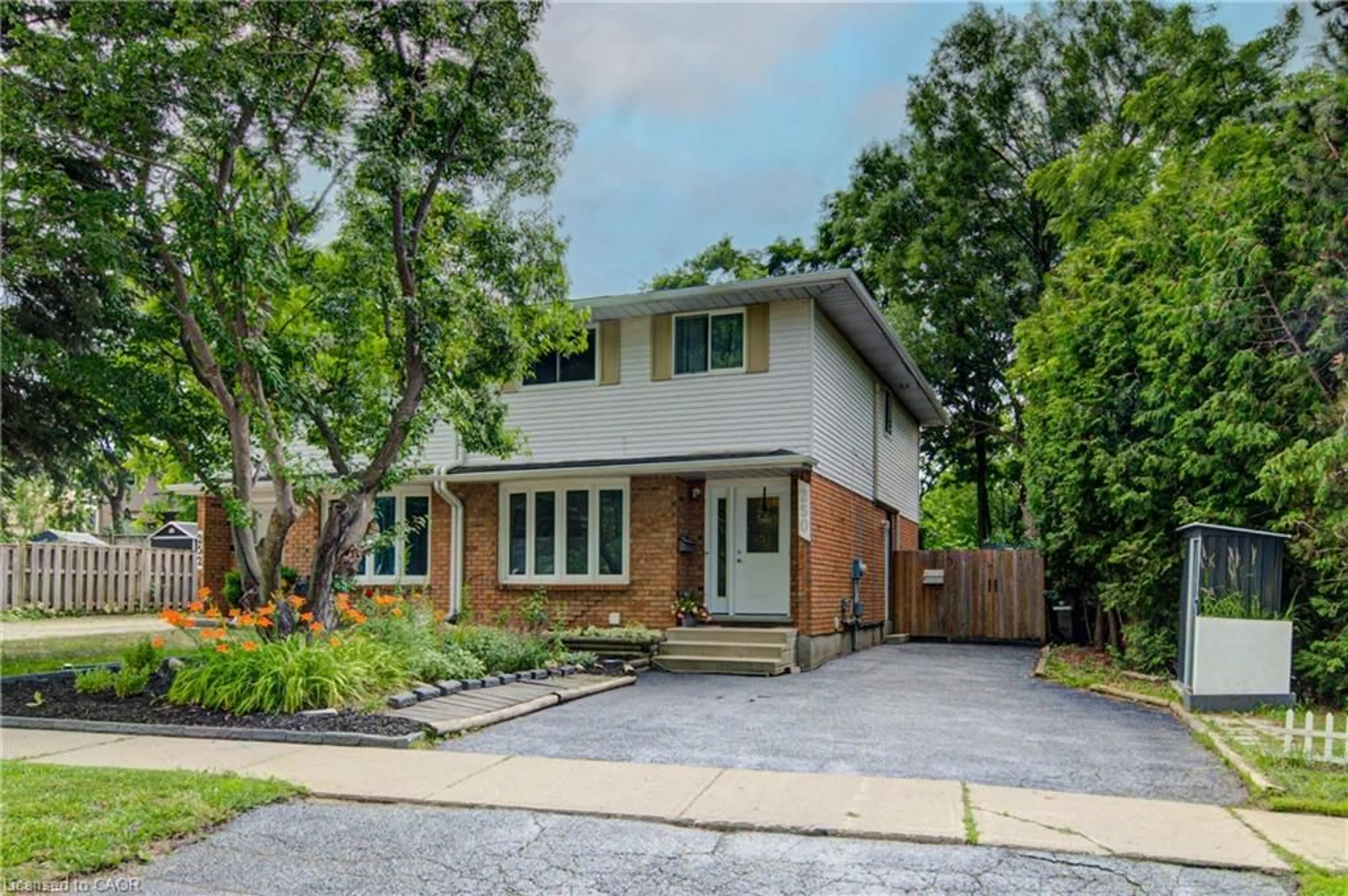 Home with brick exterior material, street for 250 Dinison Cres, Kitchener Ontario N2E 3G8