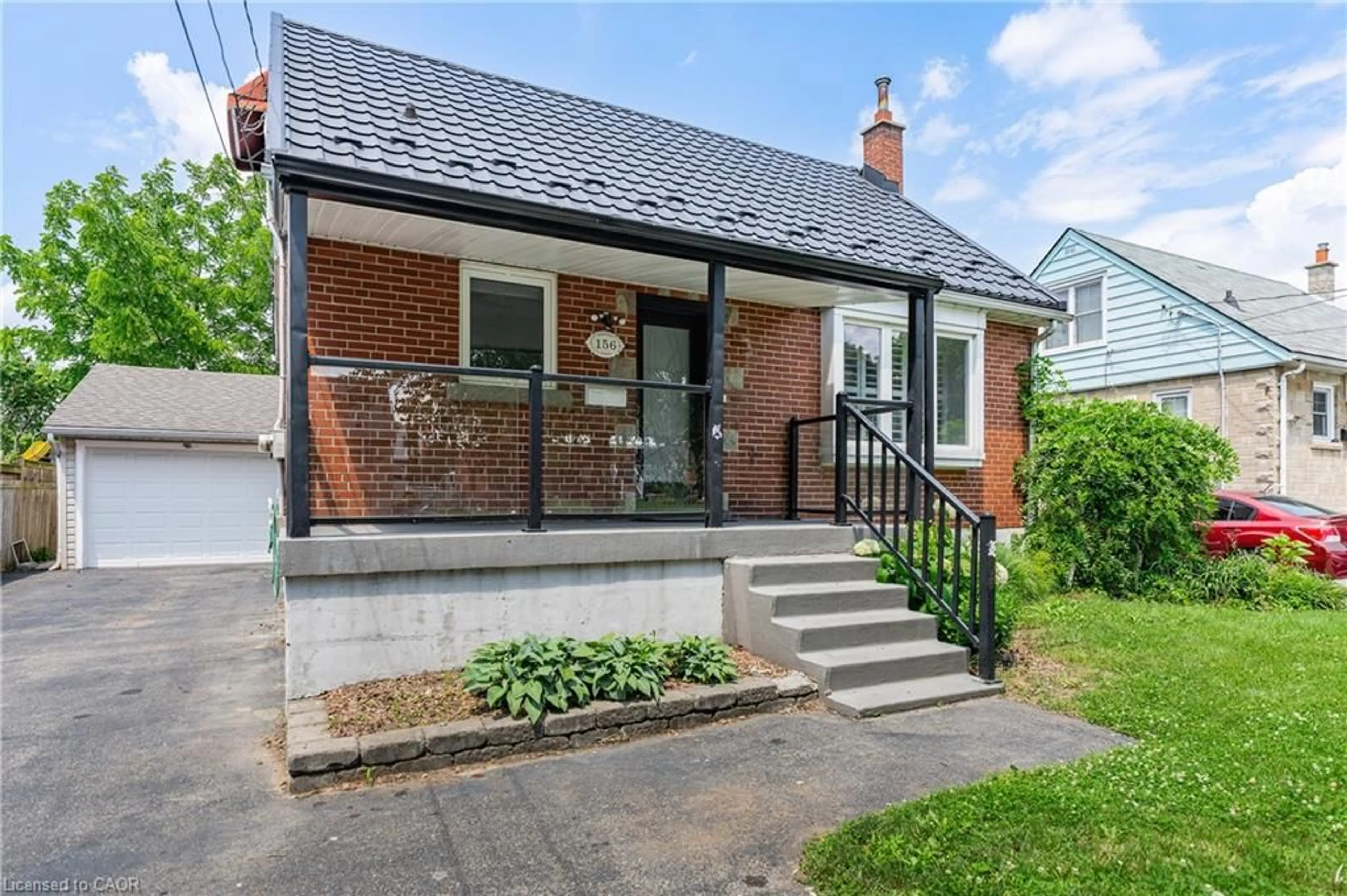 Home with brick exterior material, street for 156 Charlotte St, Hamilton Ontario L8K 4V4