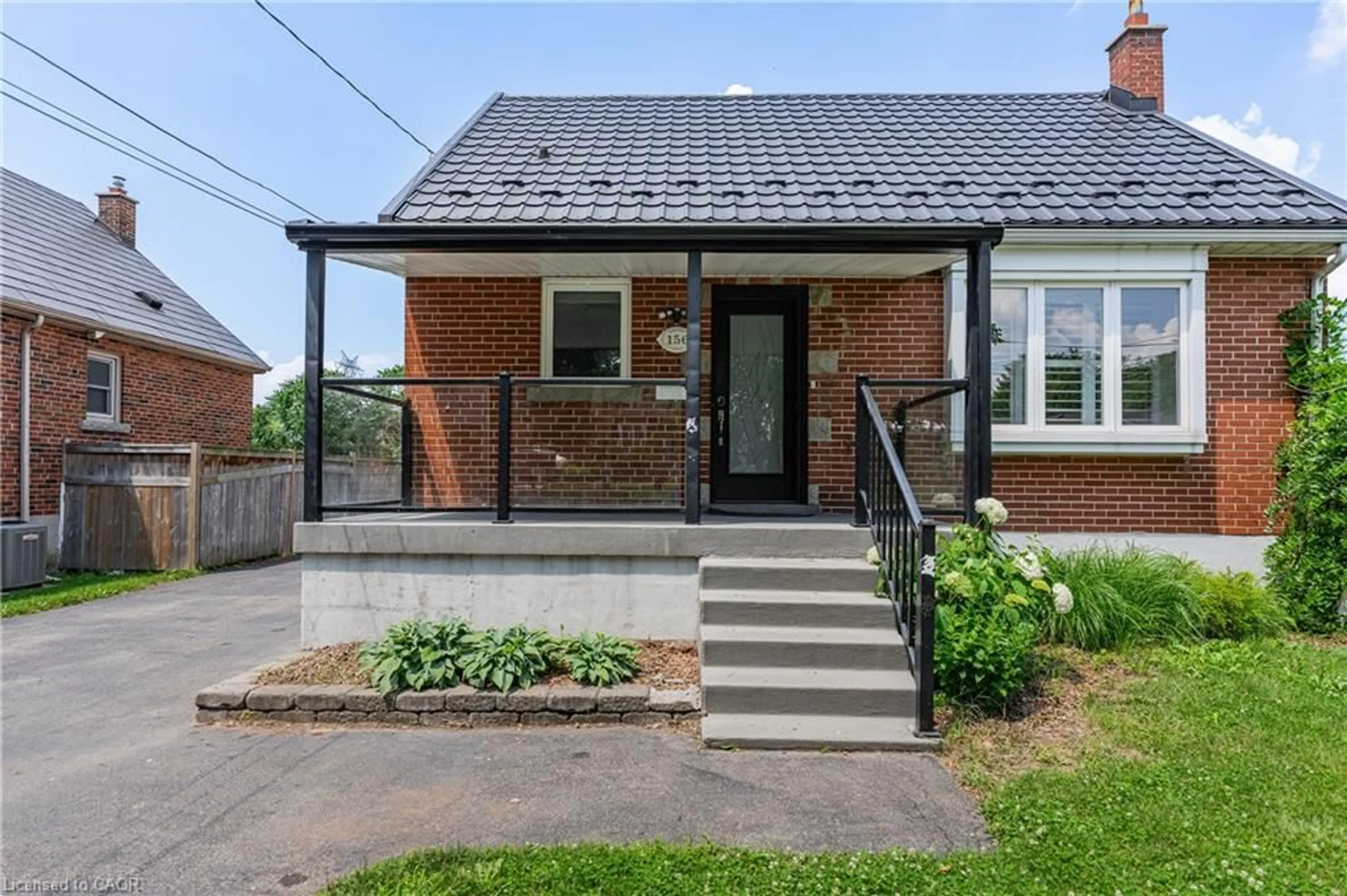 Home with brick exterior material, street for 156 Charlotte St, Hamilton Ontario L8K 4V4