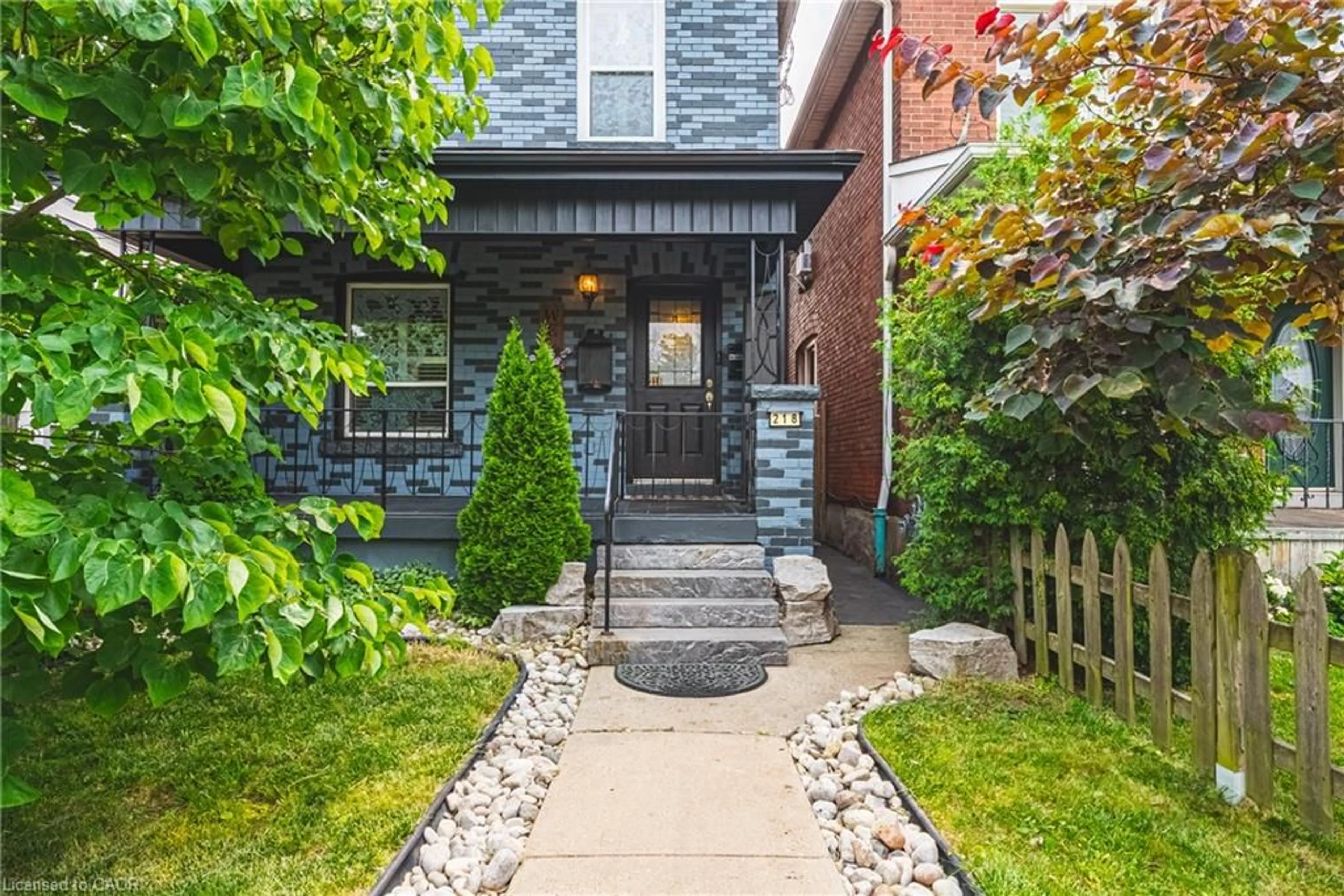 Home with brick exterior material, street for 218 Grosvenor Ave, Hamilton Ontario L8L 7S9