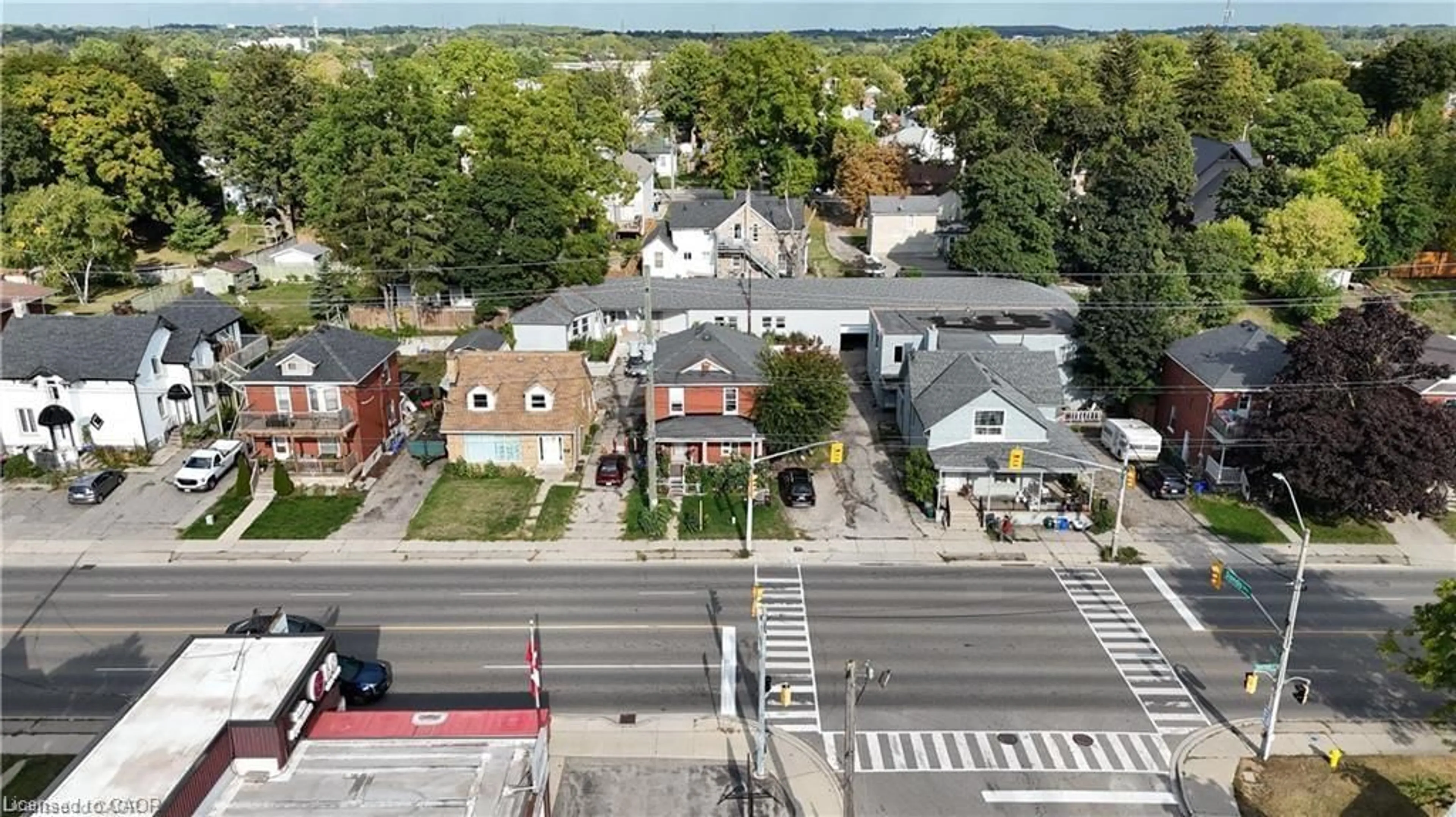 A pic from outside/outdoor area/front of a property/back of a property/a pic from drone, street for 229 Water St, Cambridge Ontario N1R 3B9