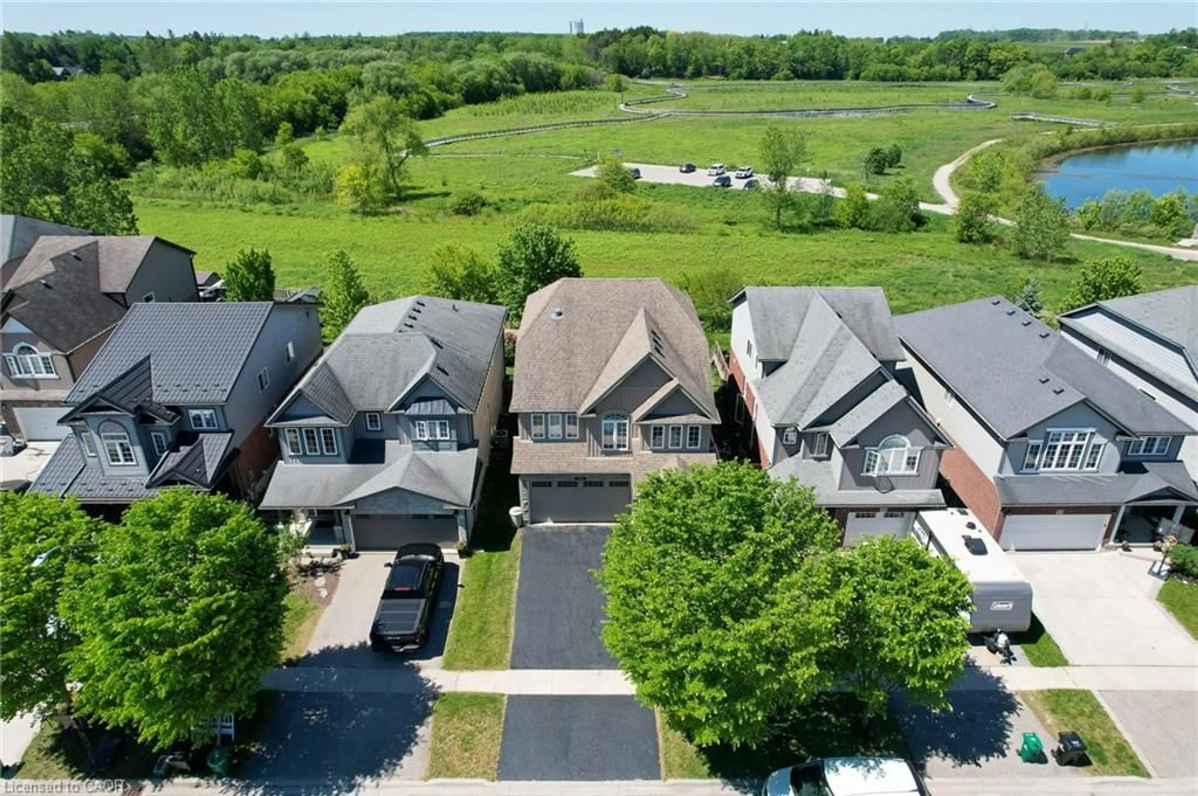 A pic from outside/outdoor area/front of a property/back of a property/a pic from drone, street for 56 Smith's Creek Dr, New Hamburg Ontario N3A 0B3