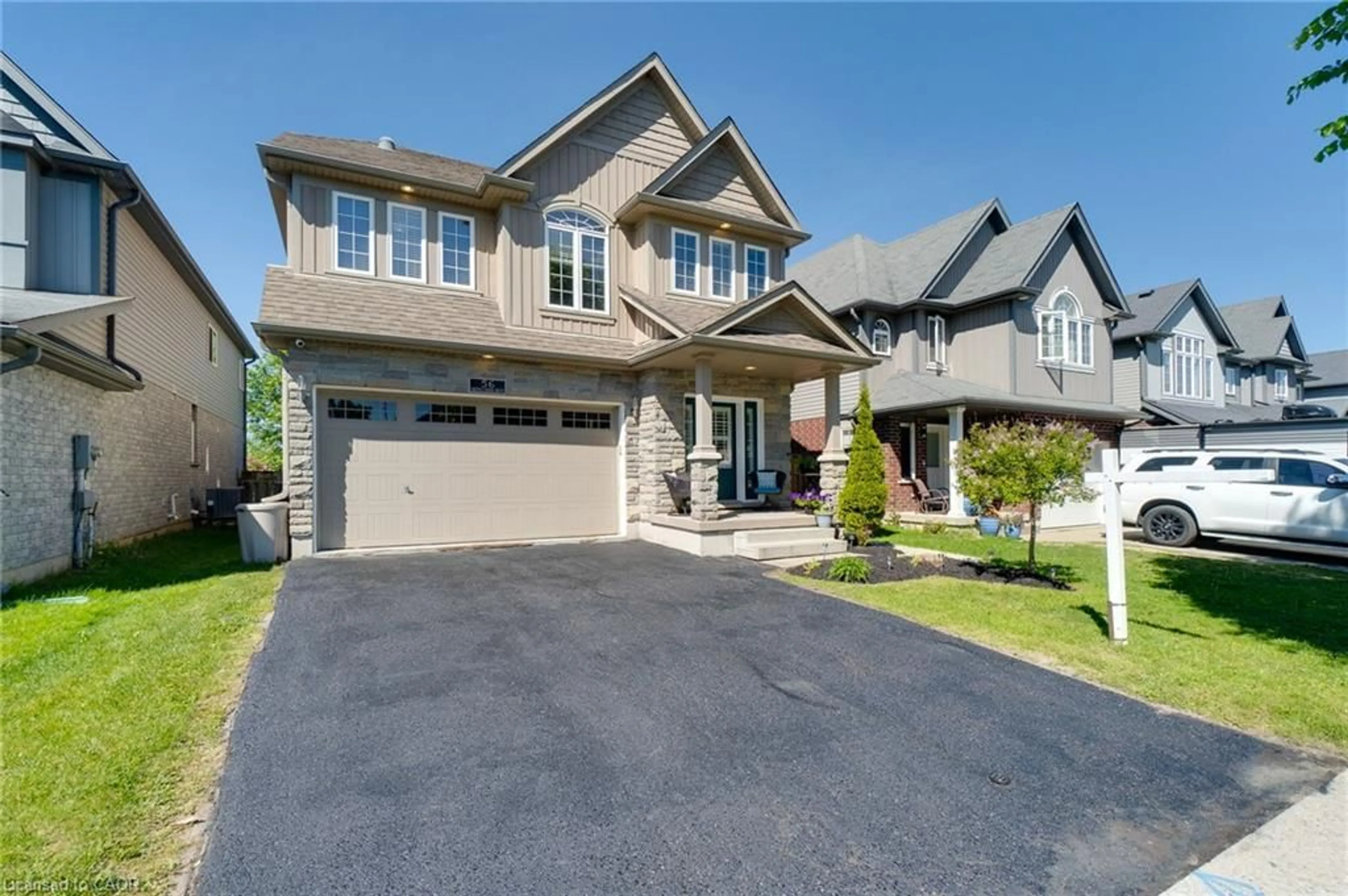 Home with brick exterior material, street for 56 Smith's Creek Dr, New Hamburg Ontario N3A 0B3