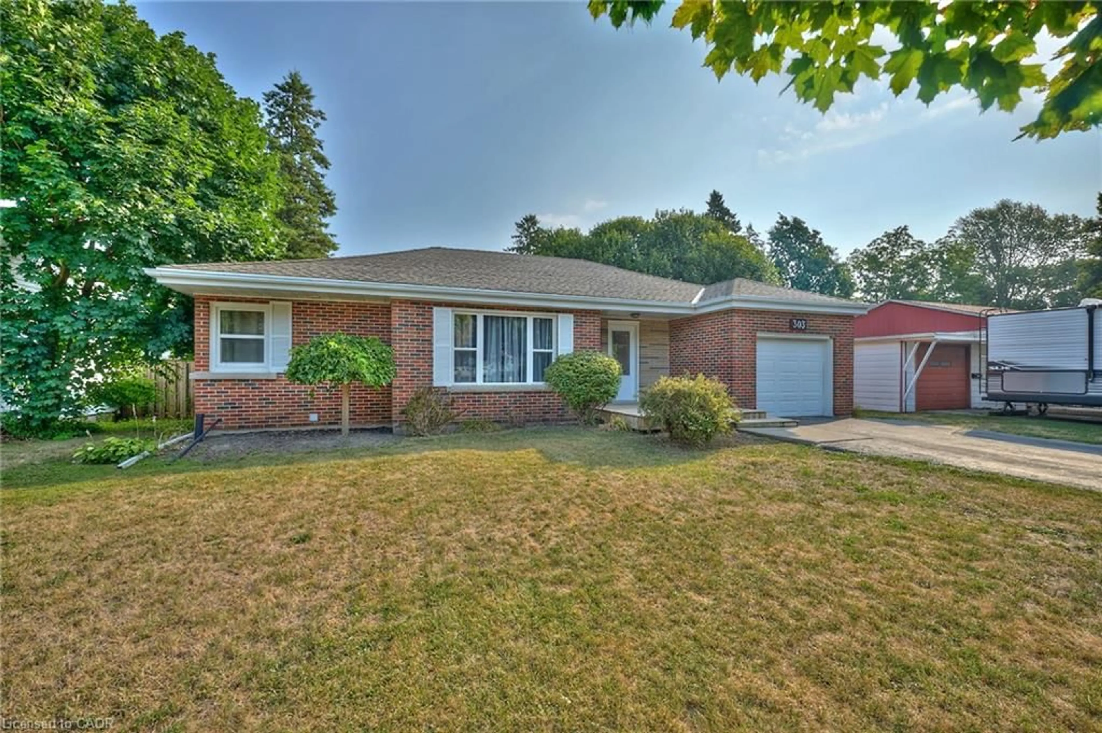 Home with brick exterior material, street for Ave, Dunnville Ontario N1A 1M7