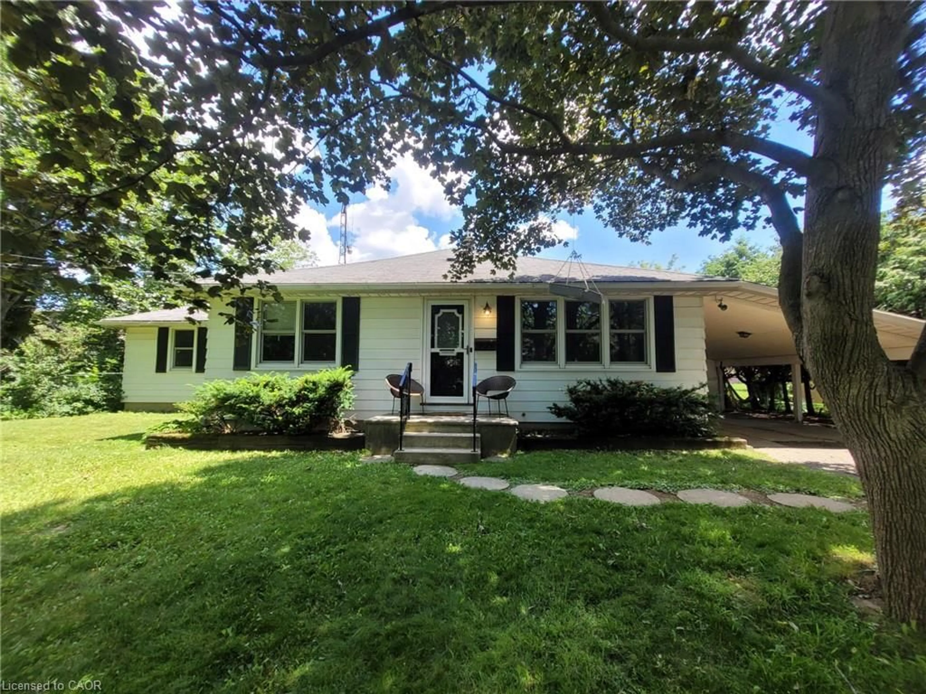 Home with vinyl exterior material, street for 879 West 5th St, Hamilton Ontario L9C 5R4