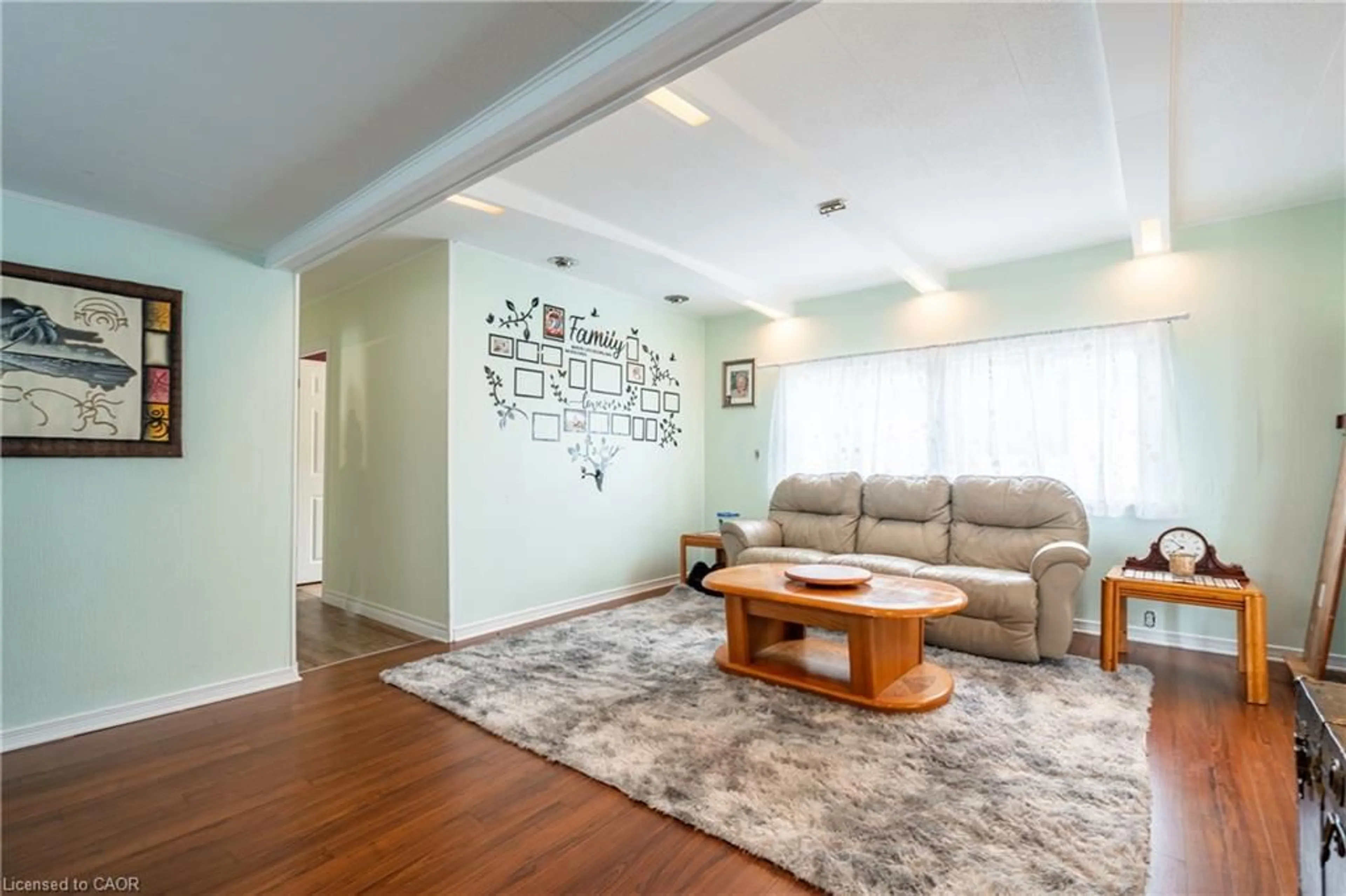 Living room with furniture, wood/laminate floor for Lane, Beamsville Ontario L0R 1B1