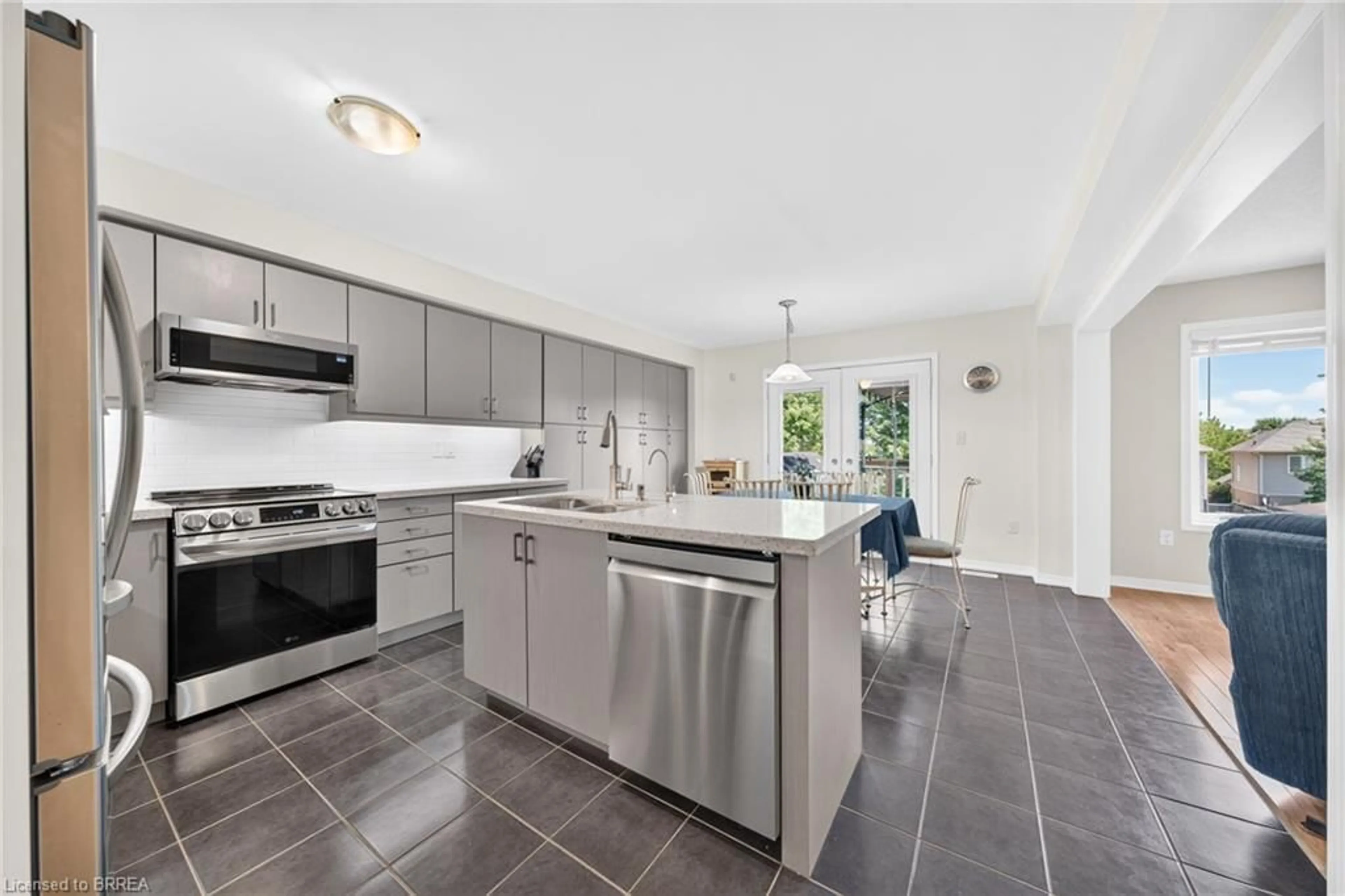 Open concept kitchen, ceramic/tile floor for 169 Powell Rd, Brantford Ontario N3T 0E6