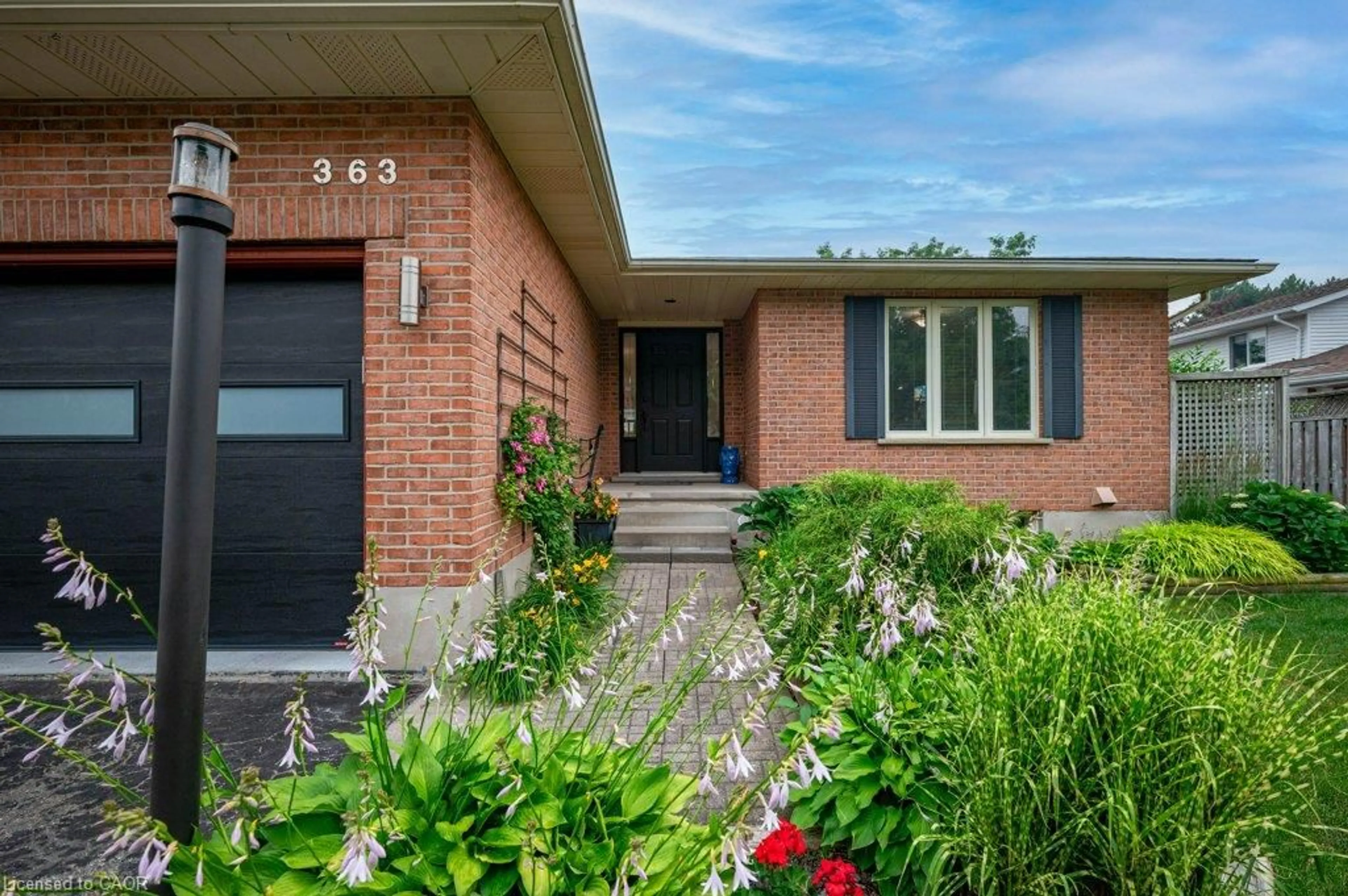Home with brick exterior material, street for 363 Twinflower Cres, Waterloo Ontario N2V 1X2