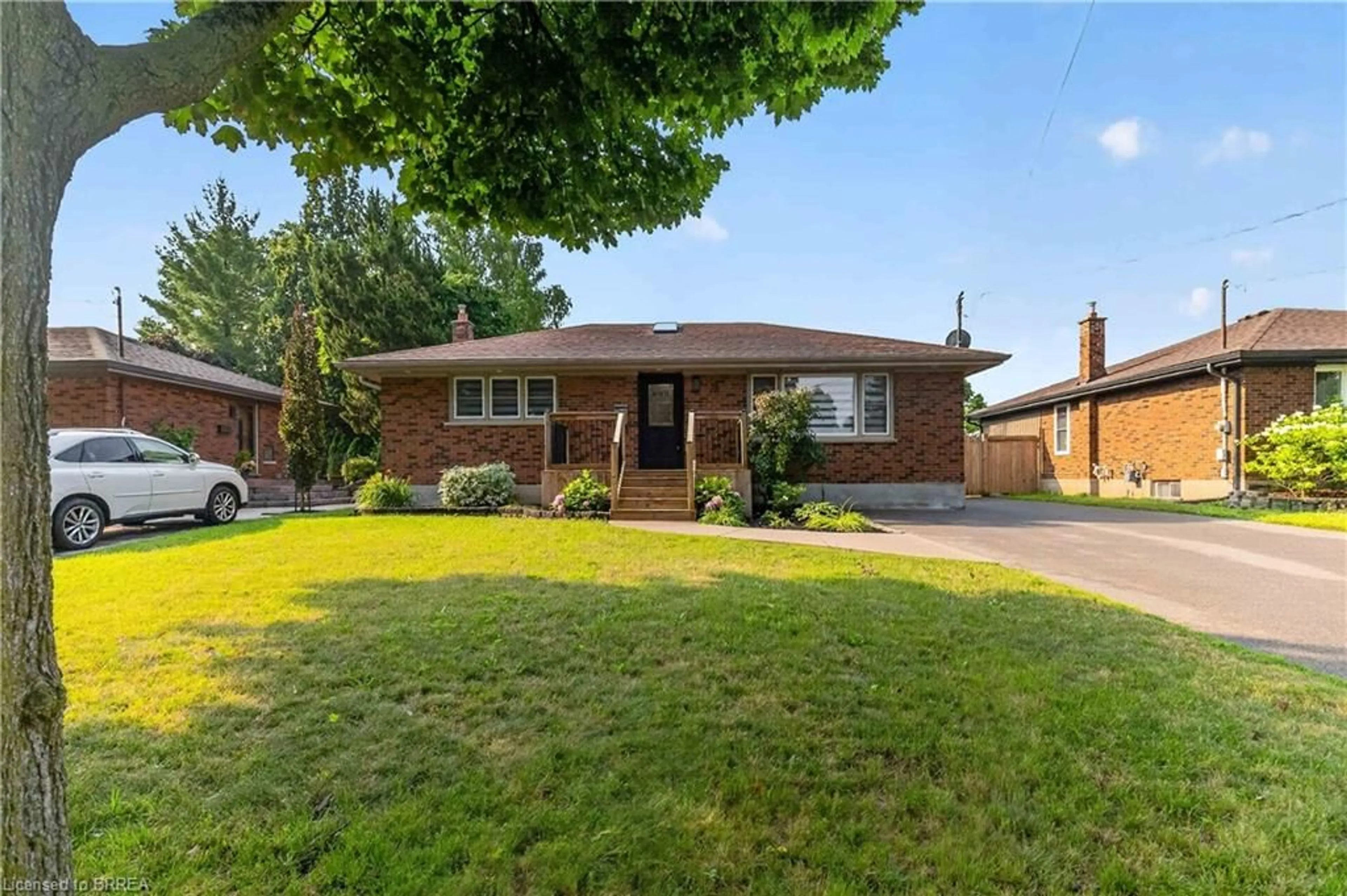 Home with brick exterior material, street for 78 Norman St, Brantford Ontario N3R 2Y2