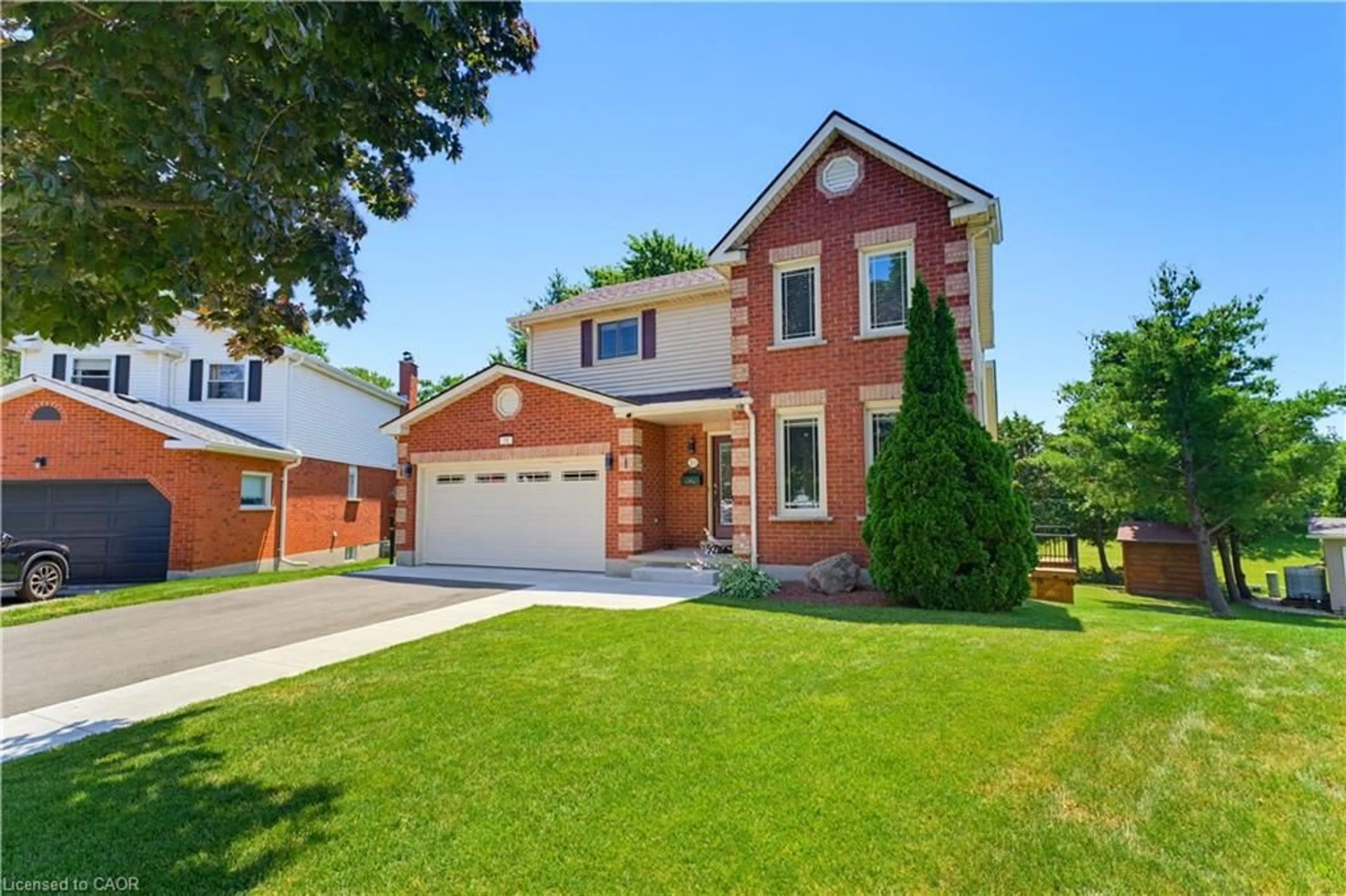 Home with brick exterior material, street for Pl, Cambridge Ontario N1S 4V8