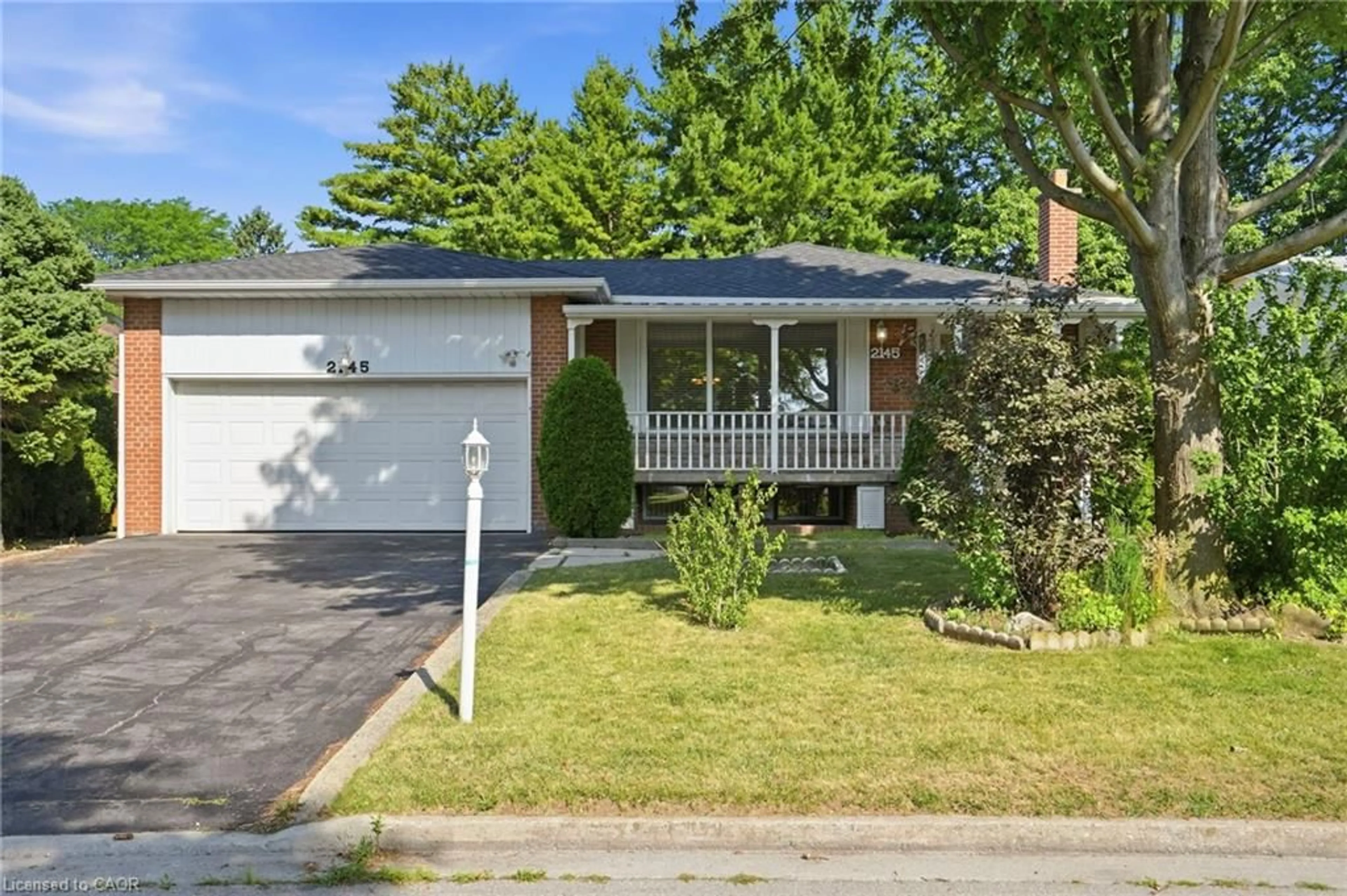 Home with brick exterior material, street for 2145 Sunnyvale Dr, Oakville Ontario L6L 1W6