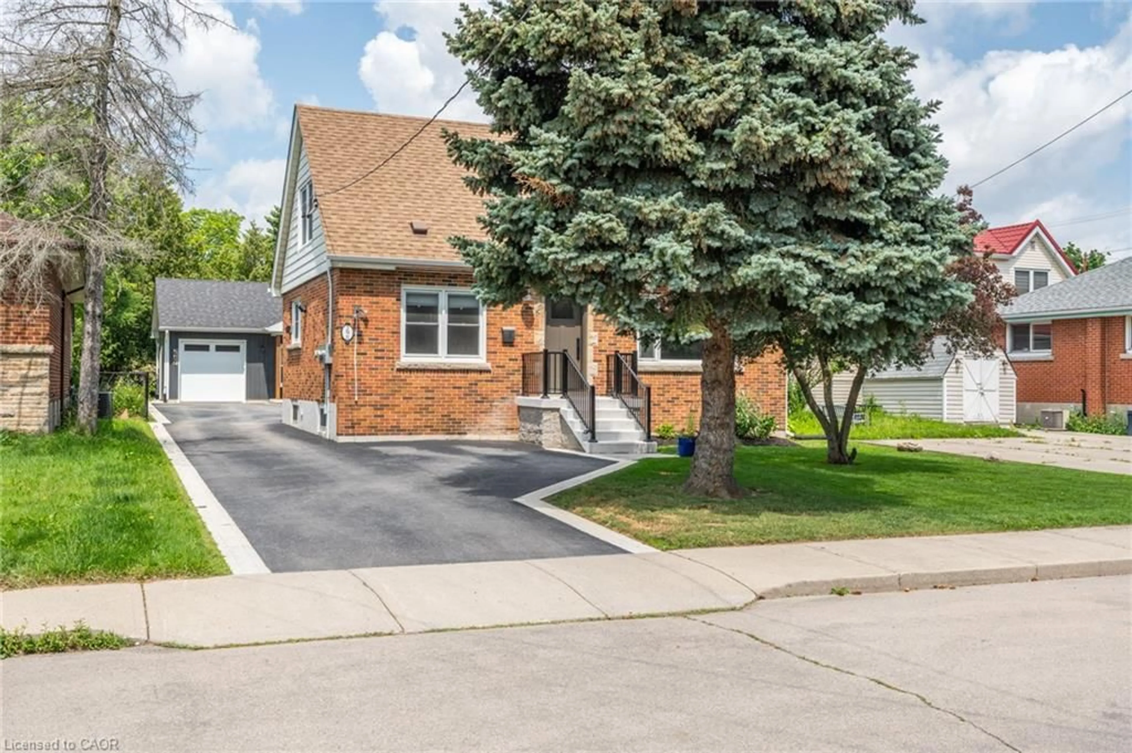 Home with brick exterior material, street for St, Hamilton Ontario L8V 3Z8