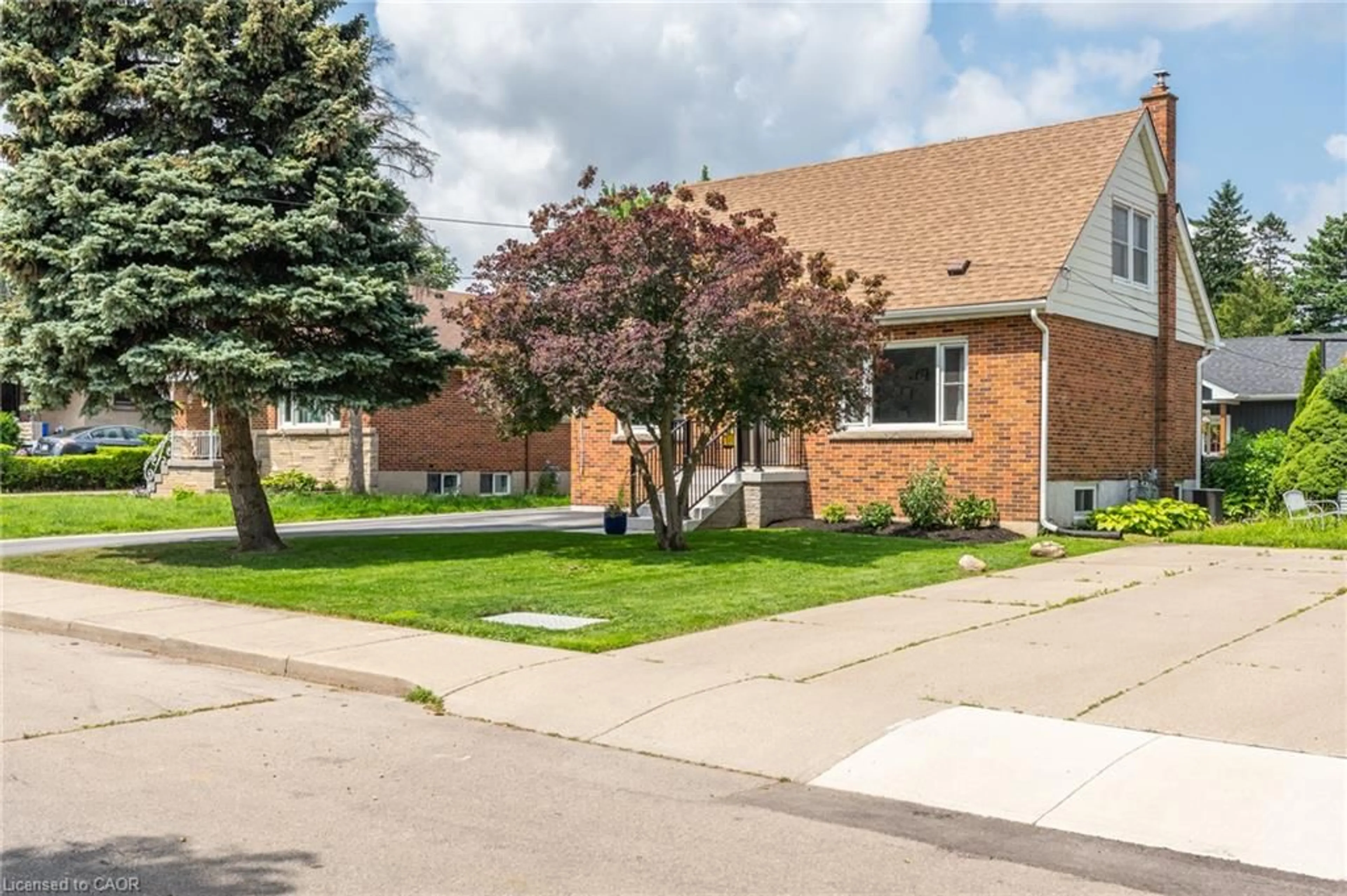 Home with brick exterior material, street for St, Hamilton Ontario L8V 3Z8