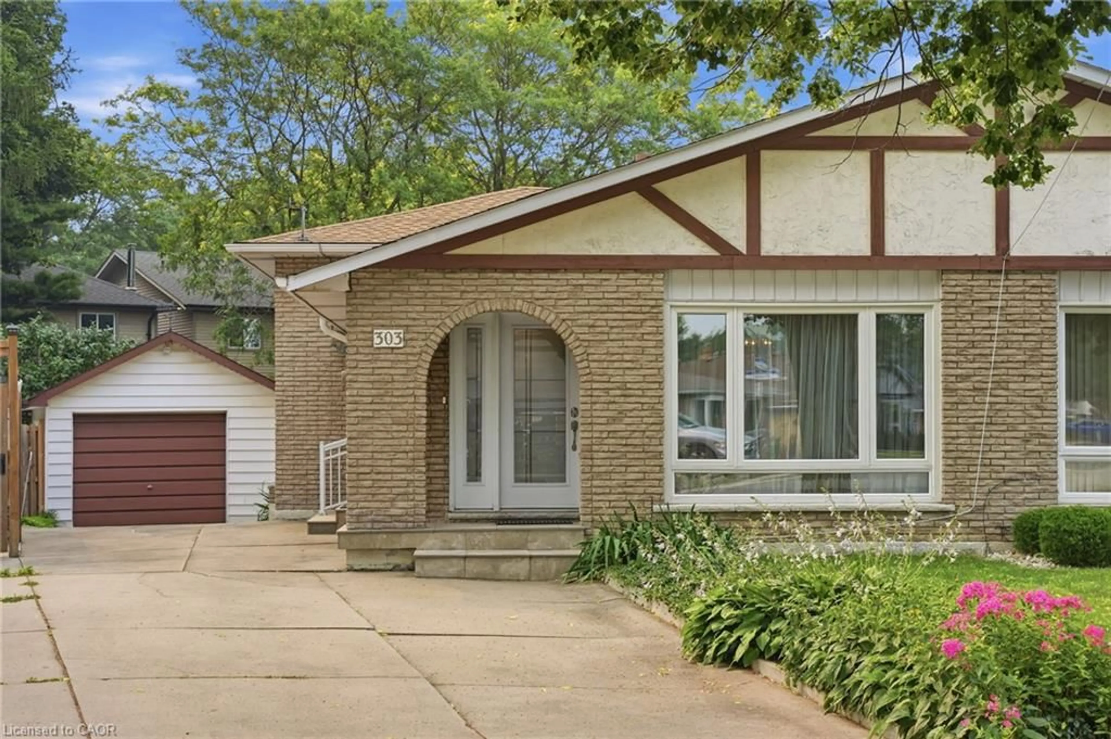Home with brick exterior material, street for 303 Wendover Dr, Hamilton Ontario L9C 5X5